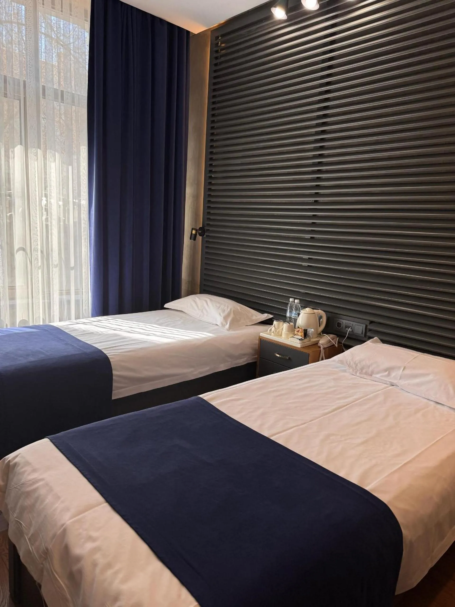 Bed in Bugu Hotel Bishkek