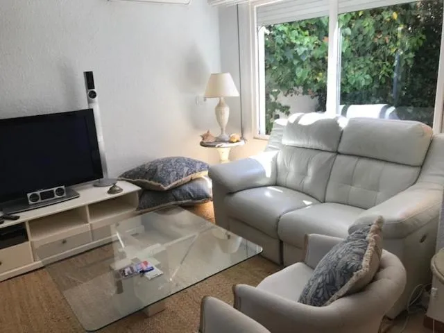 Communal lounge/ TV room in Urbanizacion Puerto Rey