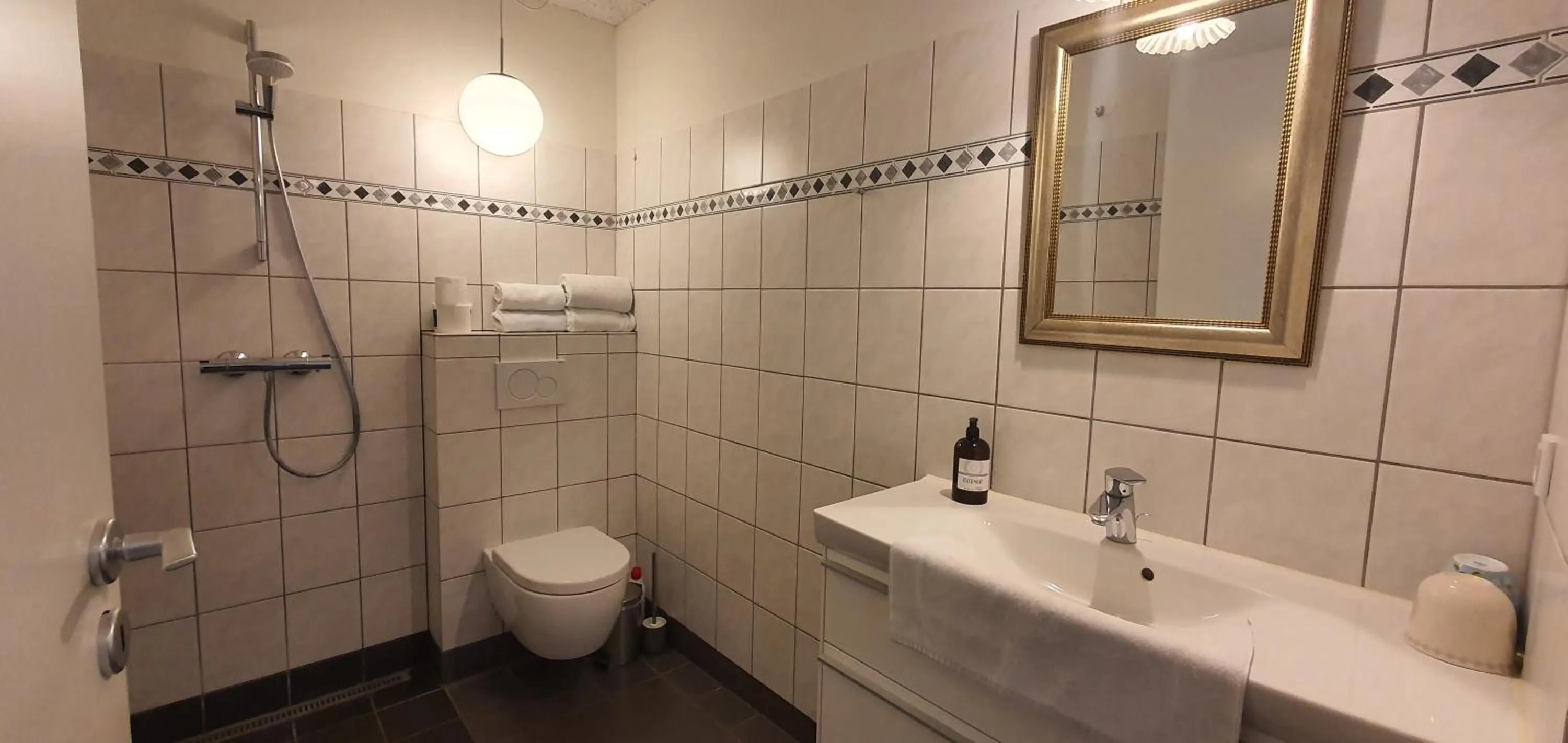 Bathroom in Næsbydale Badehotel