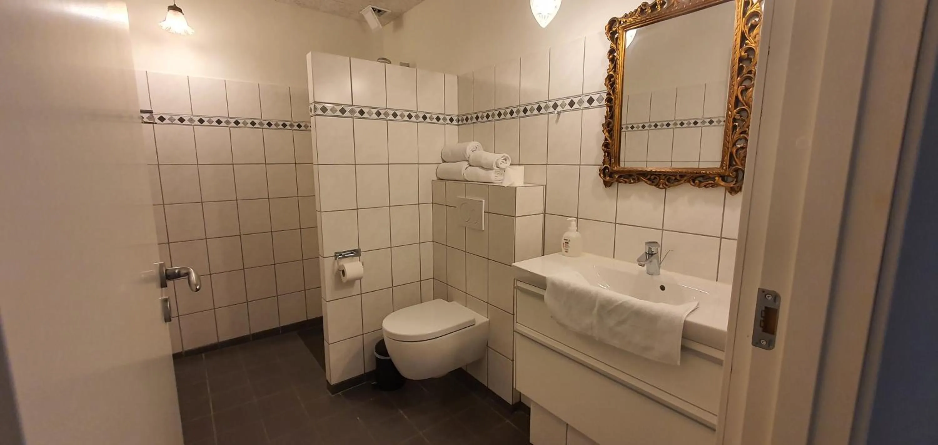 Bathroom in Næsbydale Badehotel