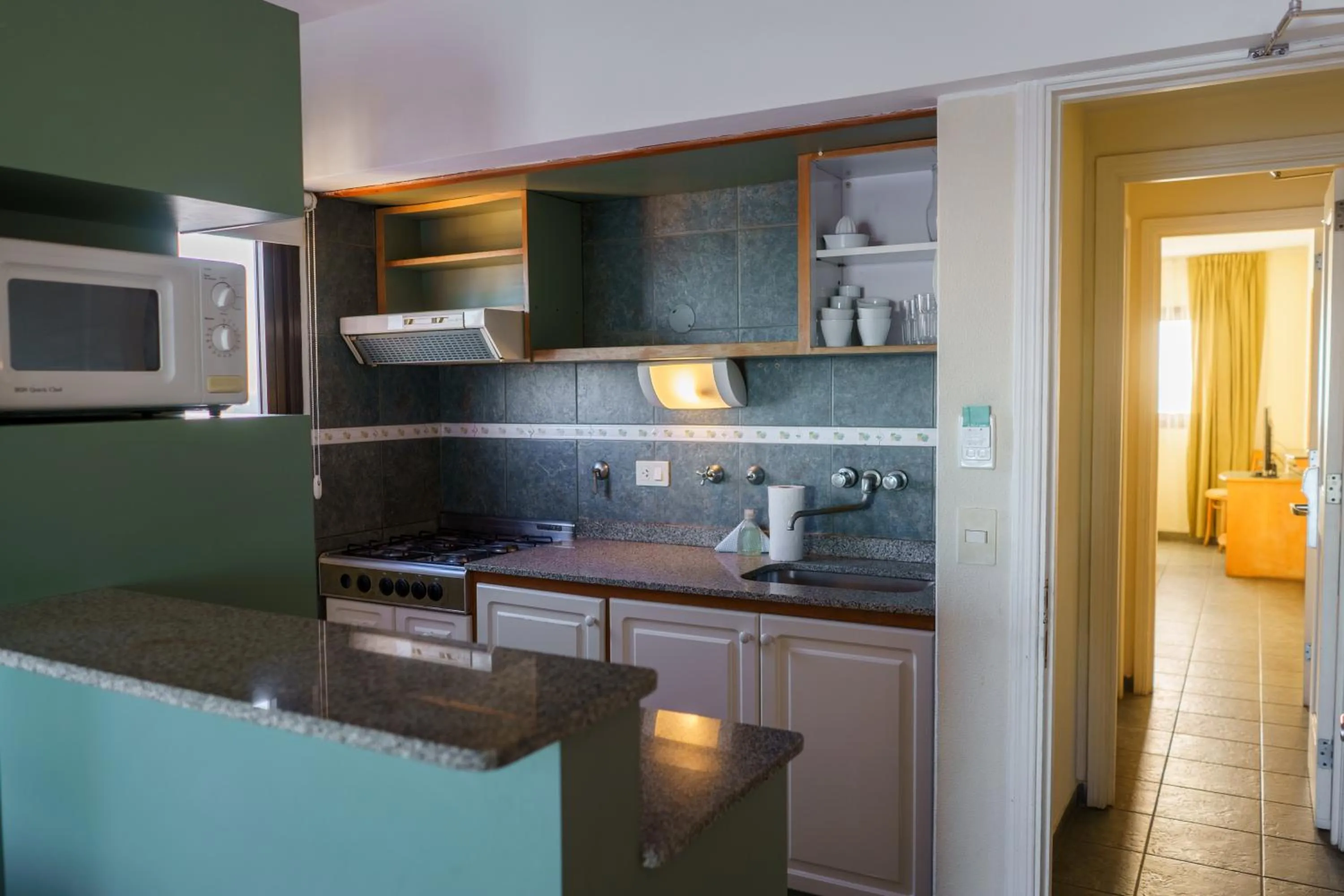 Kitchen or kitchenette in Hostal del Sol