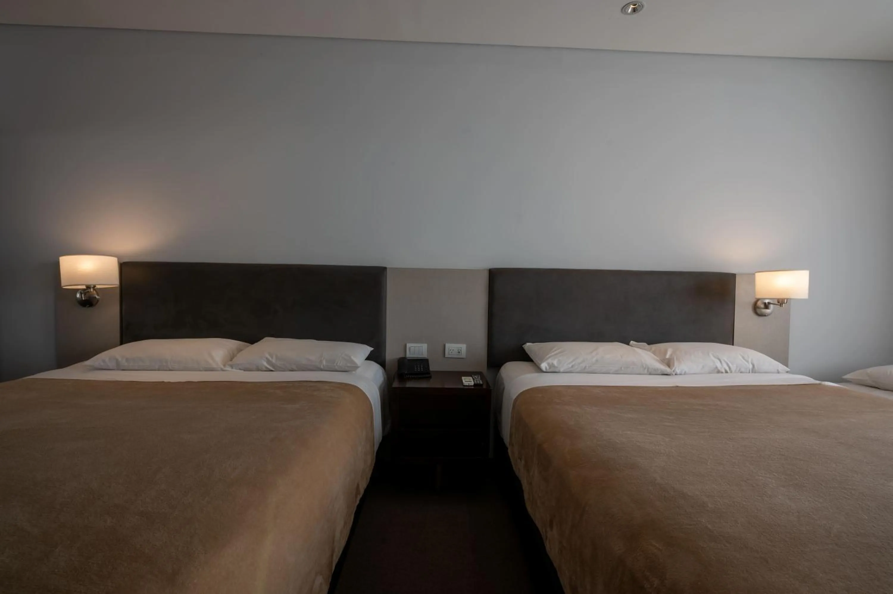 Bed in Howard Johnson Plaza Villa Carlos Paz