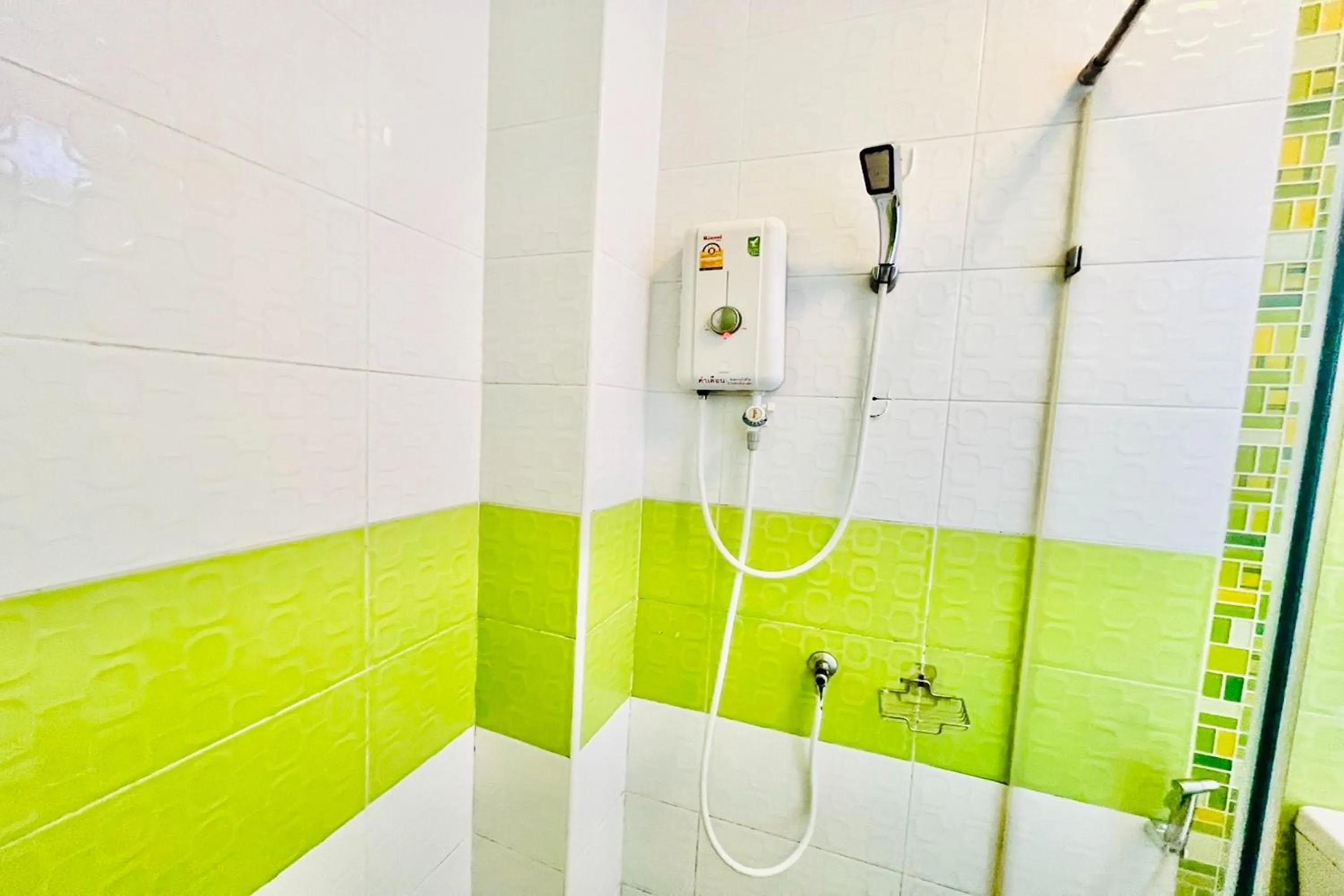 Shower in Veerakit Grand Hotel