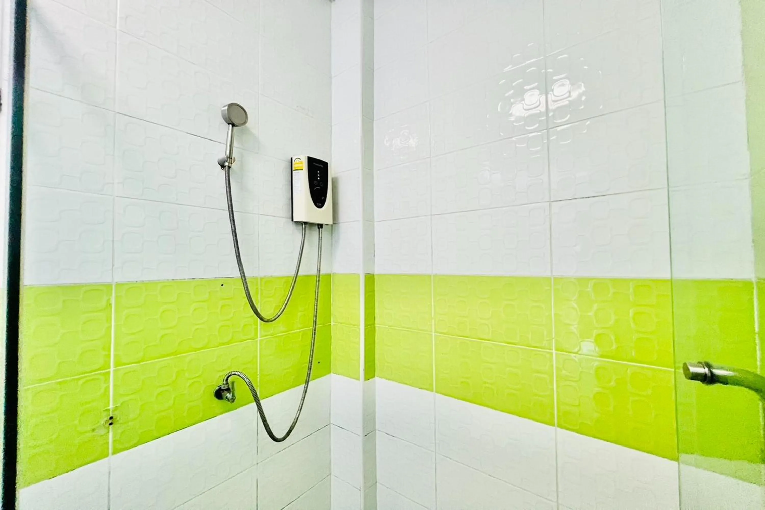 Shower in Veerakit Grand Hotel