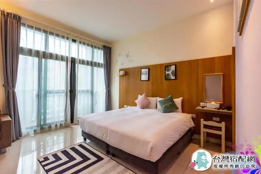 Bed in Kenting Dio Inn Bed in Kenting Dio Inn