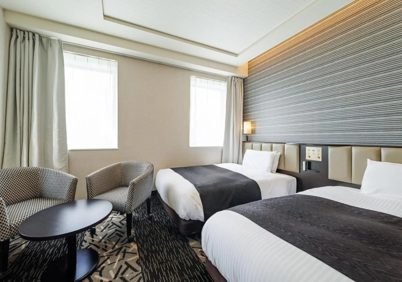 Bed in APA Hotel Miyazaki Nobeoka Chuo