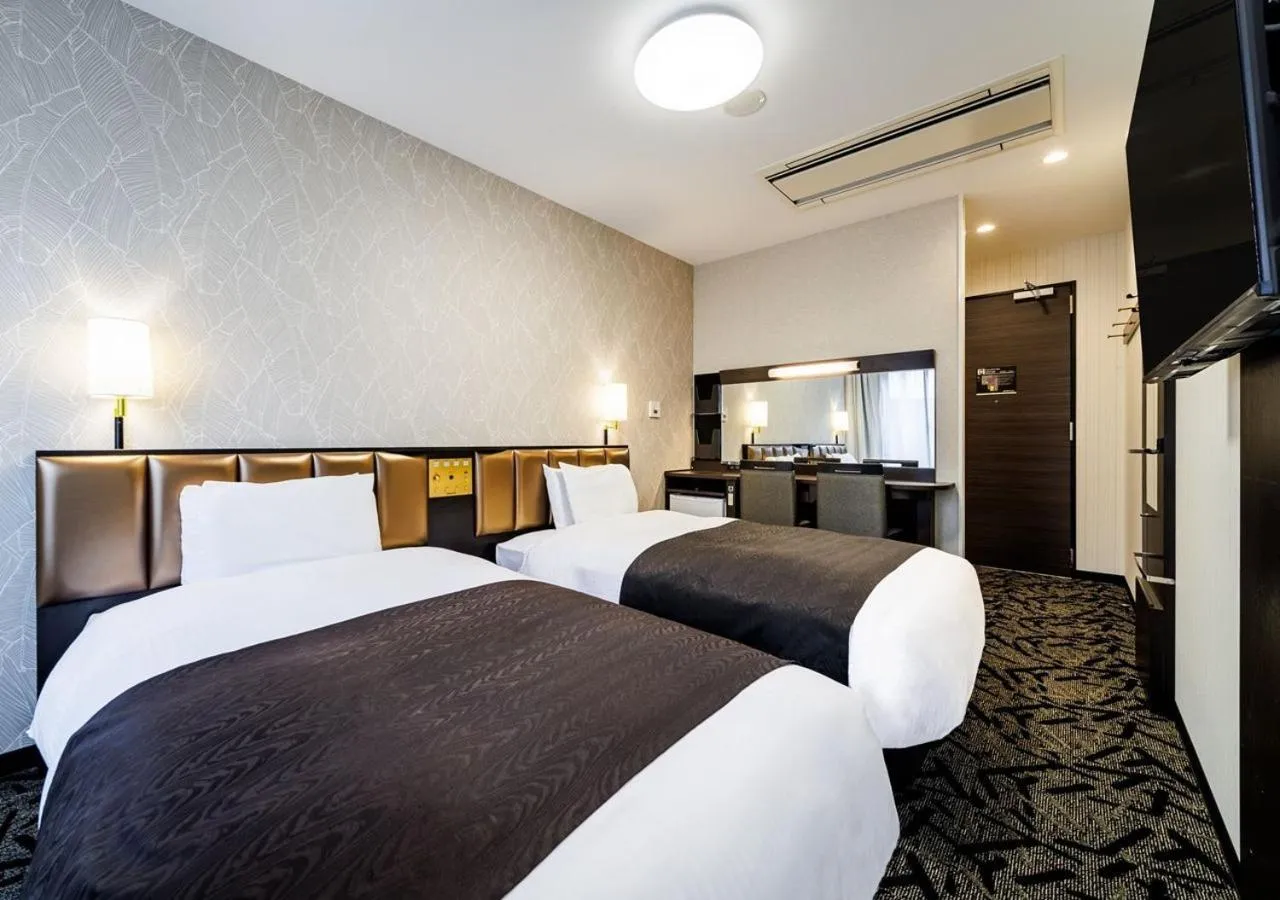 Bed in APA Hotel Miyazaki Nobeoka Chuo