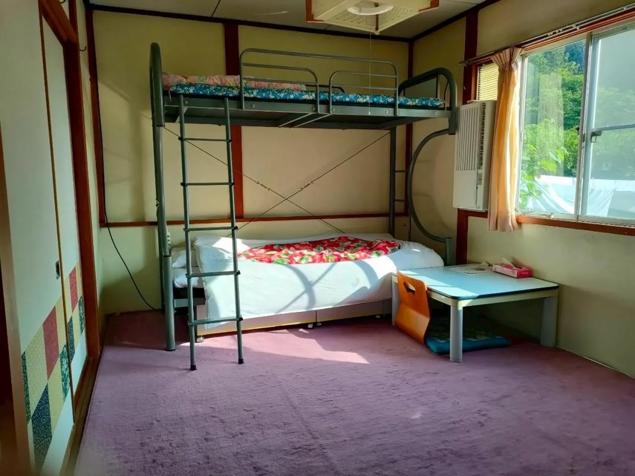 Single Bed in Dormitory Room in Guest House Sun Island