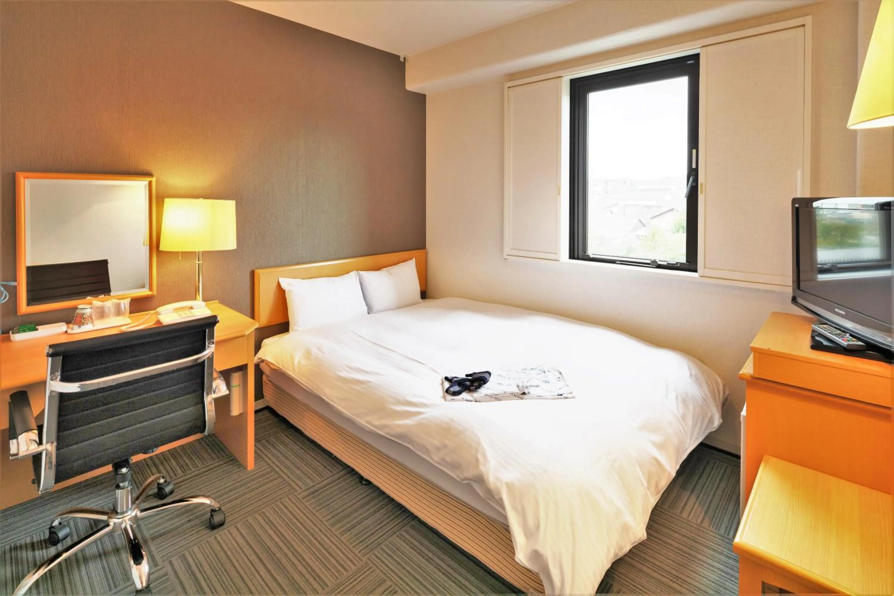 Photo of the whole room, Bed in Central Hotel Imari