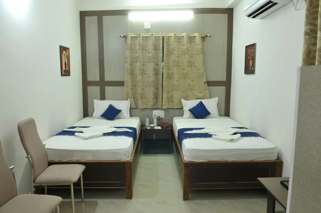 Bed in New Hotel Shiva