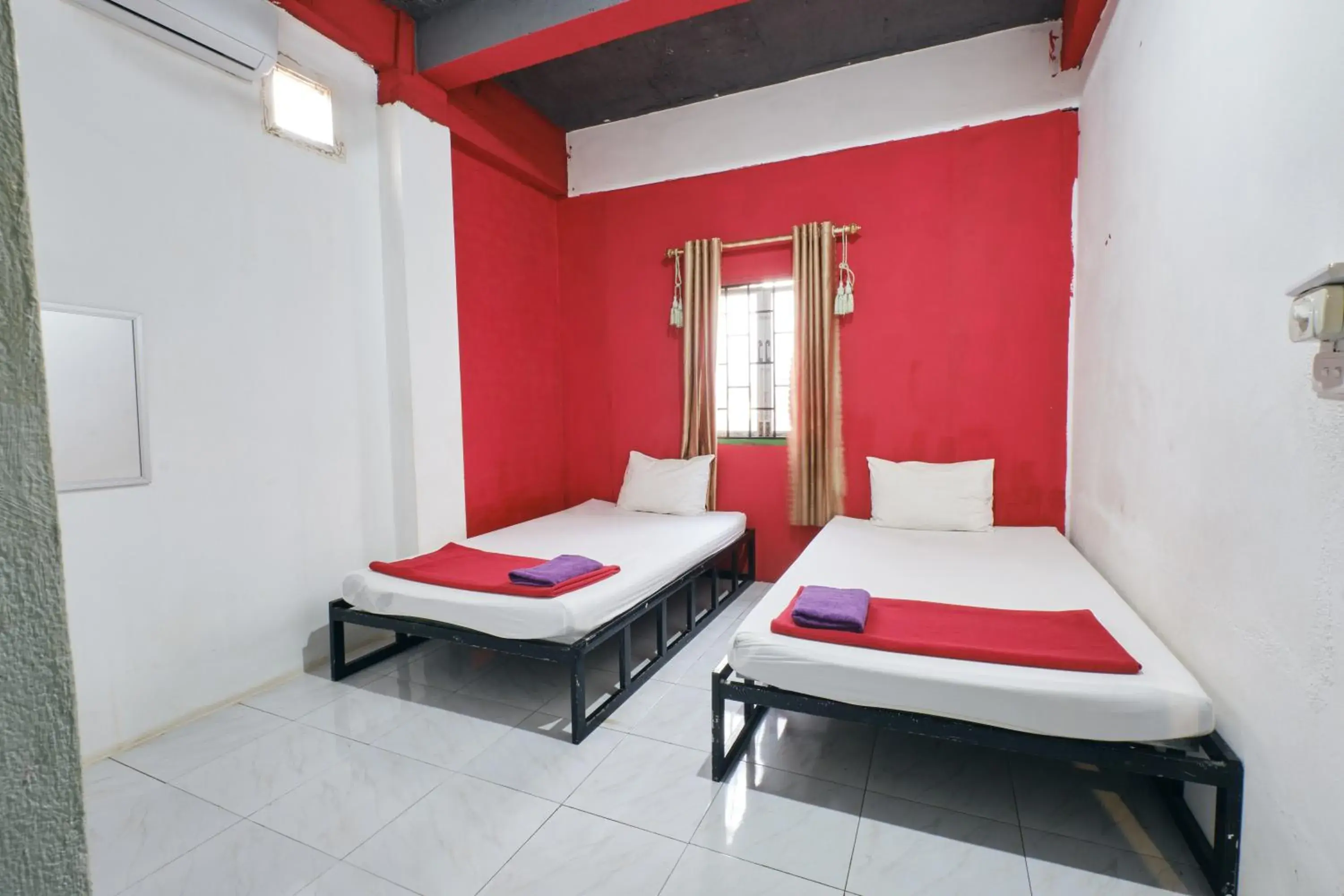 Decorative detail, Bed in Vangvieng Rock Backpacker Rooftop Hostel Decorative detail, Bed in Vangvieng Rock Backpacker Rooftop Hostel