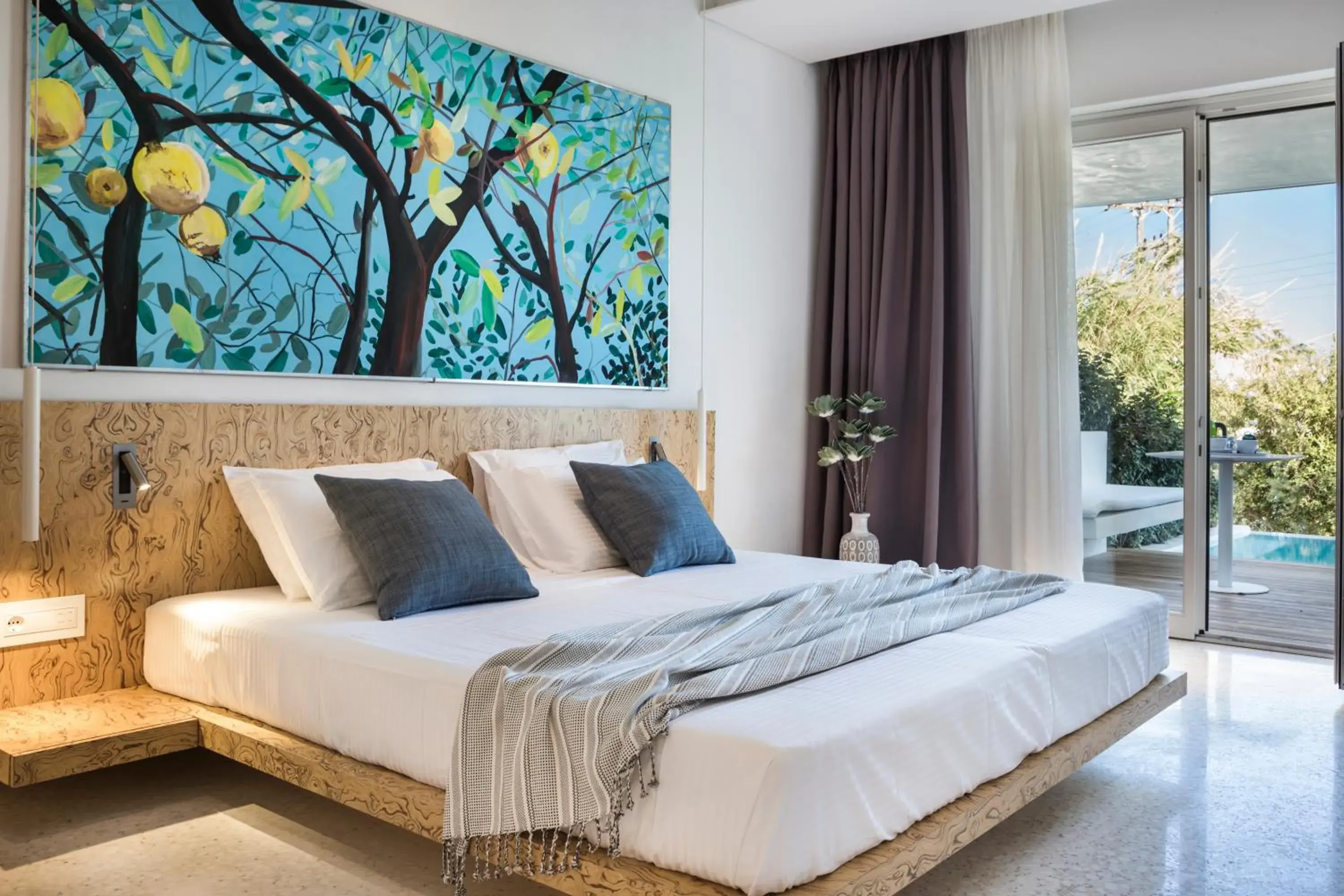 Balcony/Terrace, Bed in Mykonos Dove Beachfront Hotel Balcony/Terrace, Bed in Mykonos Dove Beachfront Hotel