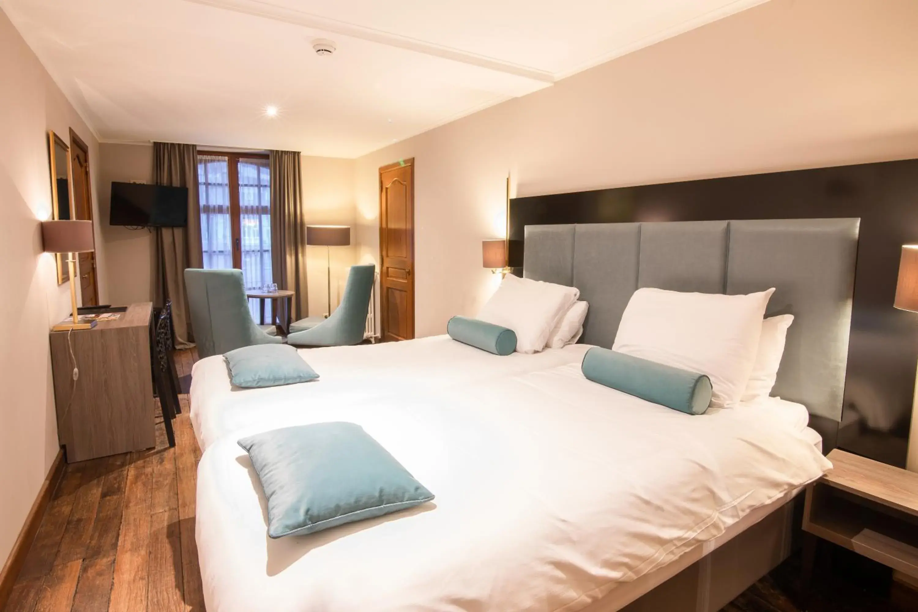 Twin Room with River View in Hotel de la Poste - Relais de Napoleon III Twin Room with River View in Hotel de la Poste - Relais de Napoleon III