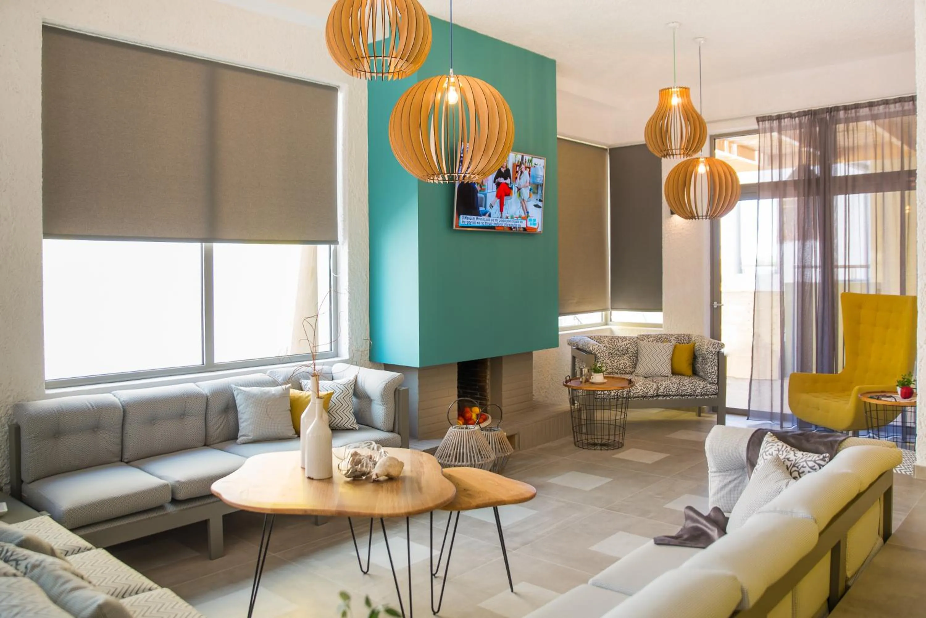 Communal lounge/ TV room in Sunshine Boutique Hotel by Estia