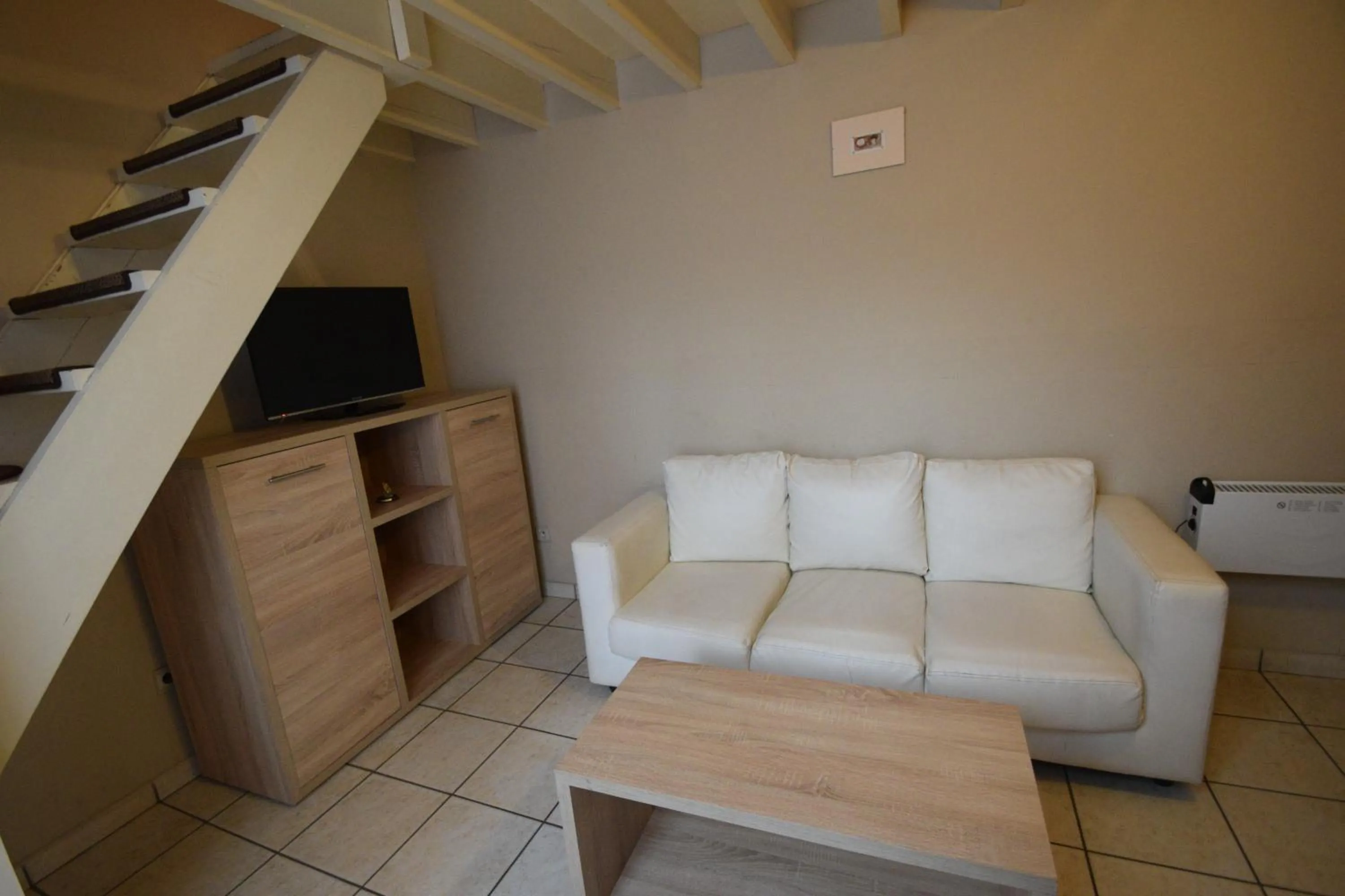 Seating area in Condo Gardens Leuven