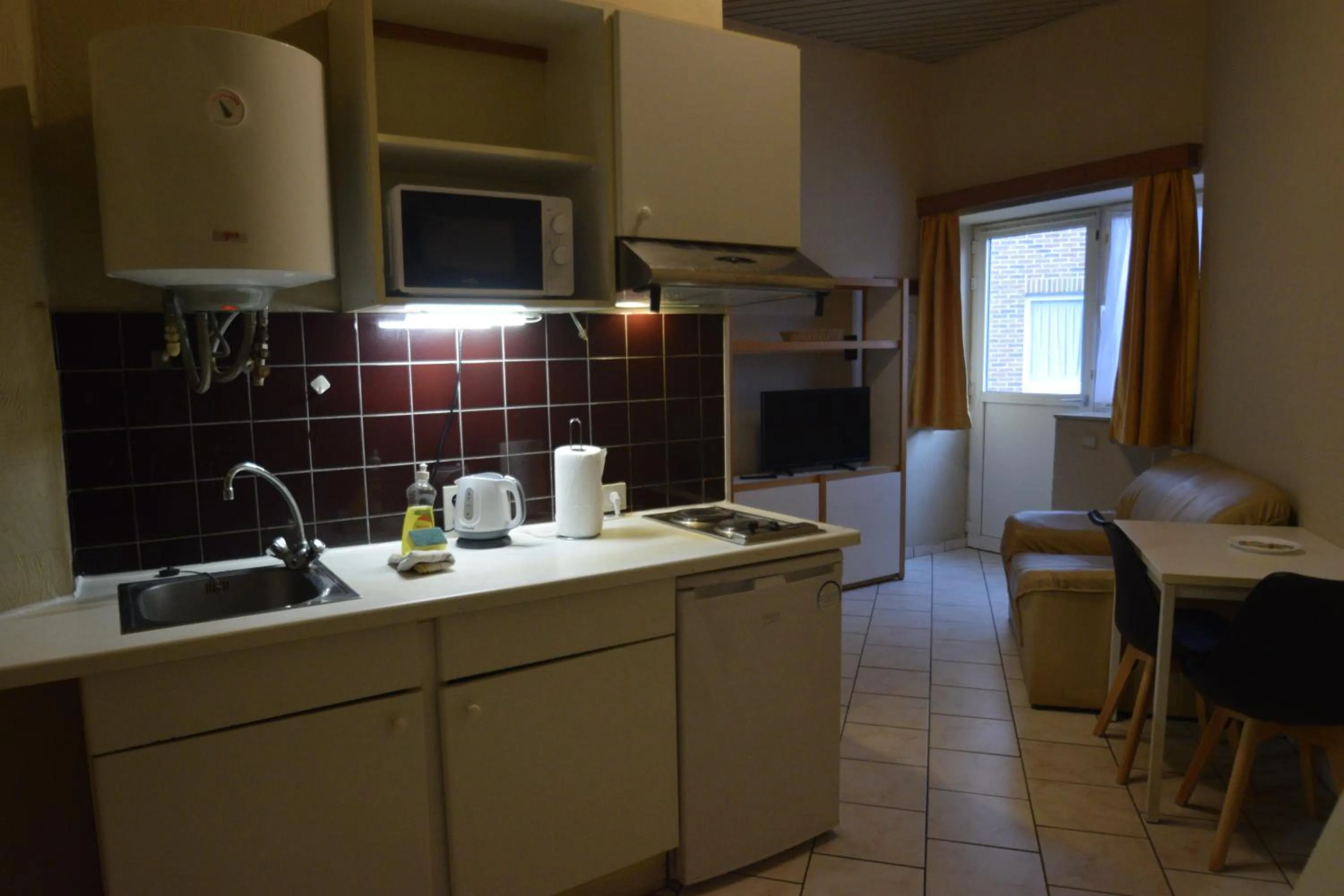 Kitchen or kitchenette in Condo Gardens Leuven