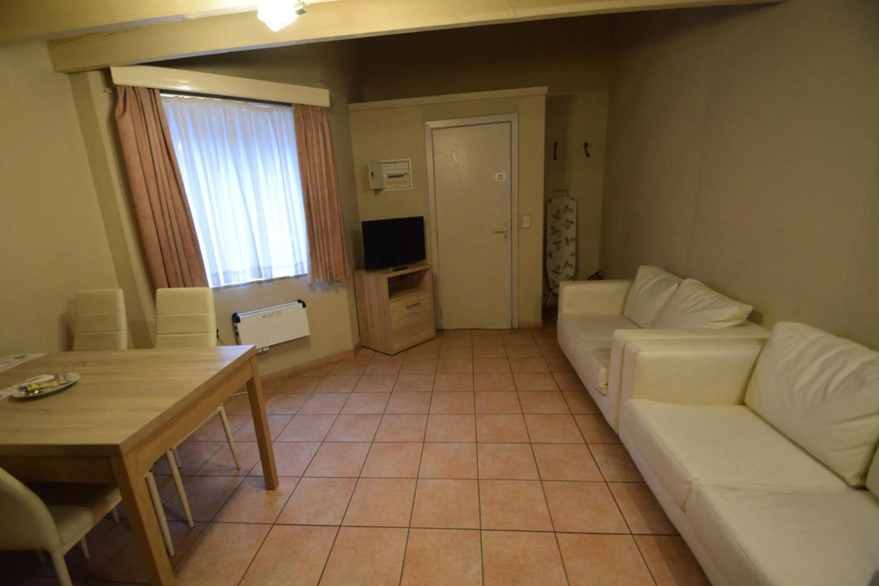 Seating area in Condo Gardens Leuven