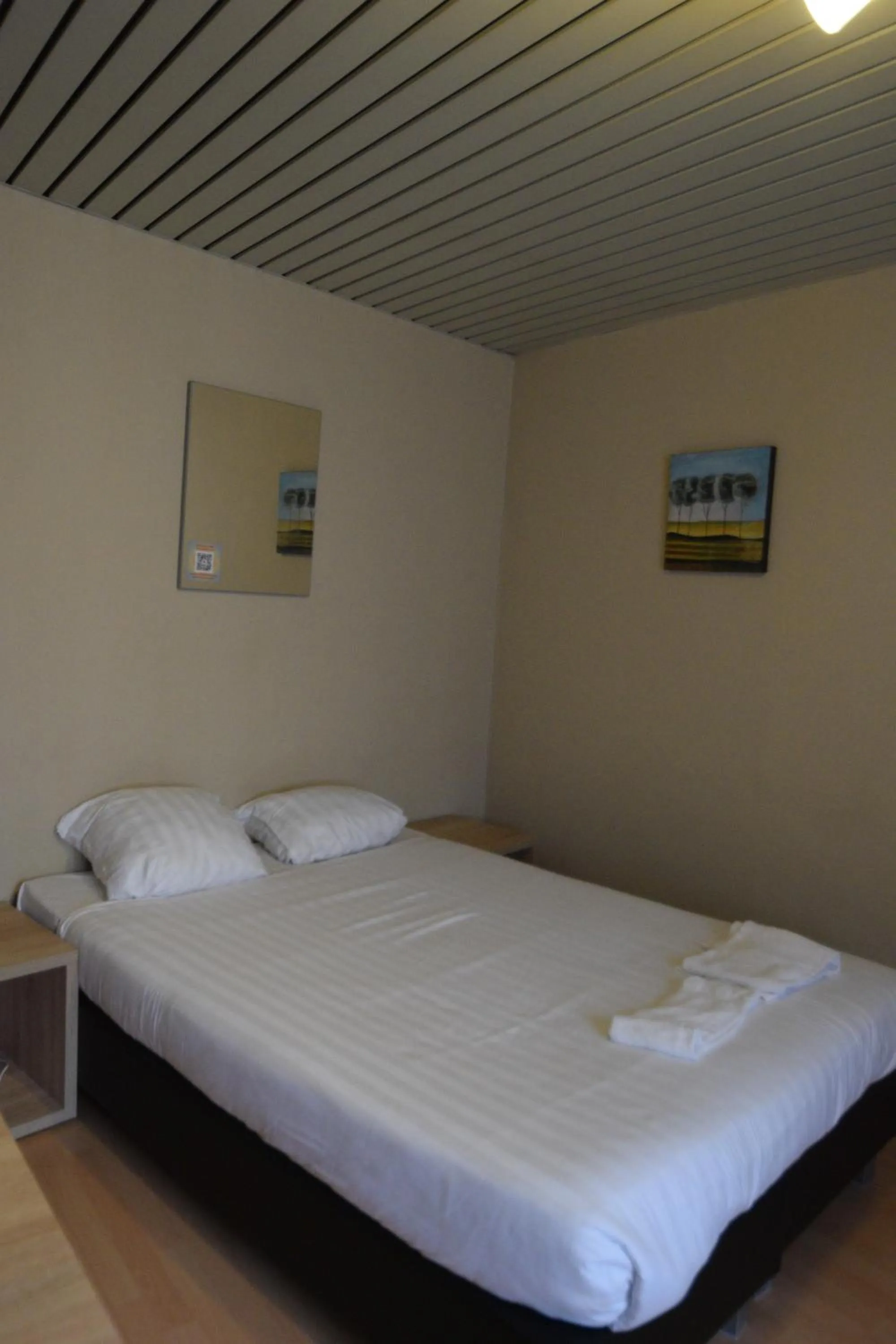 Bed in Condo Gardens Leuven