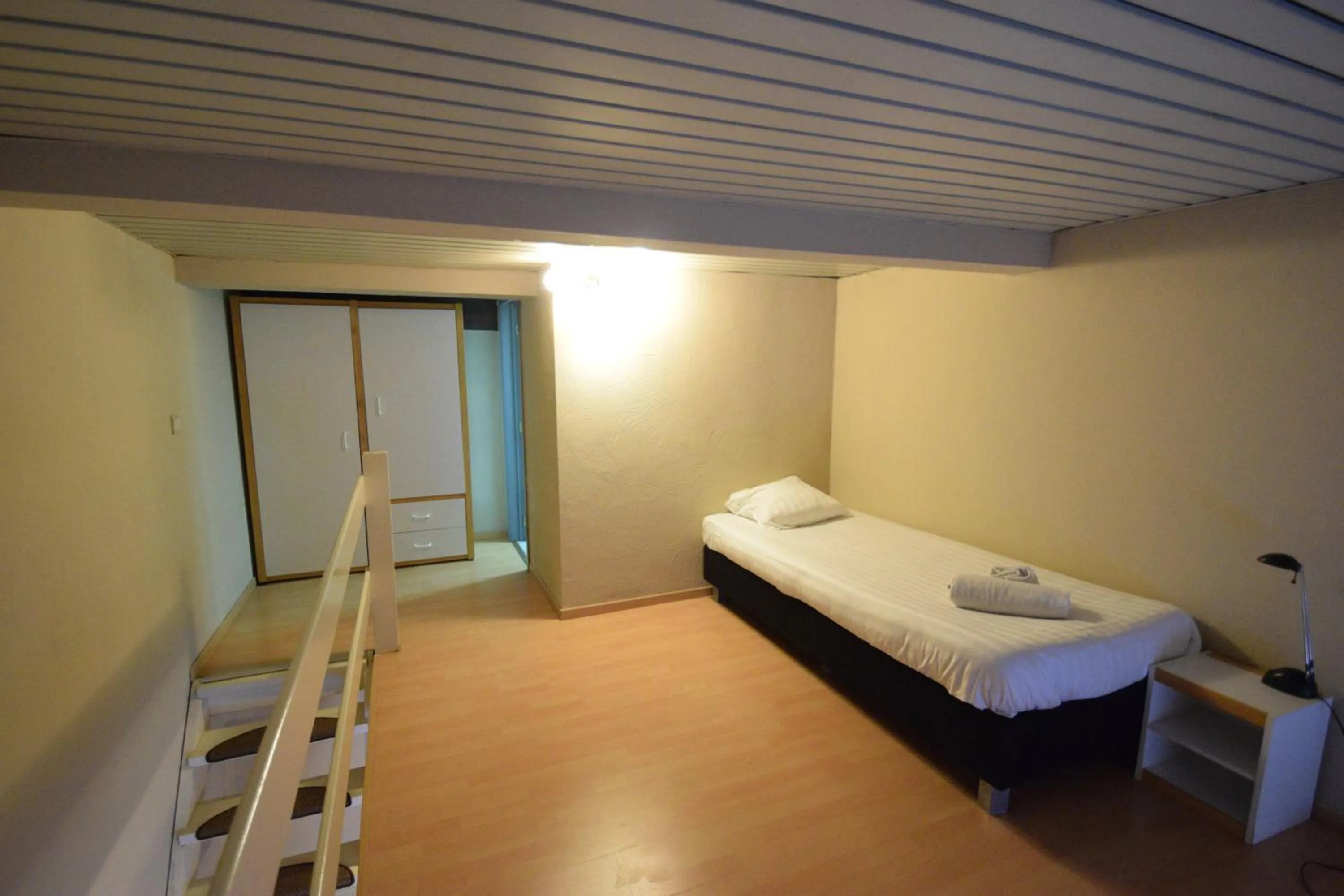 Bed in Condo Gardens Leuven