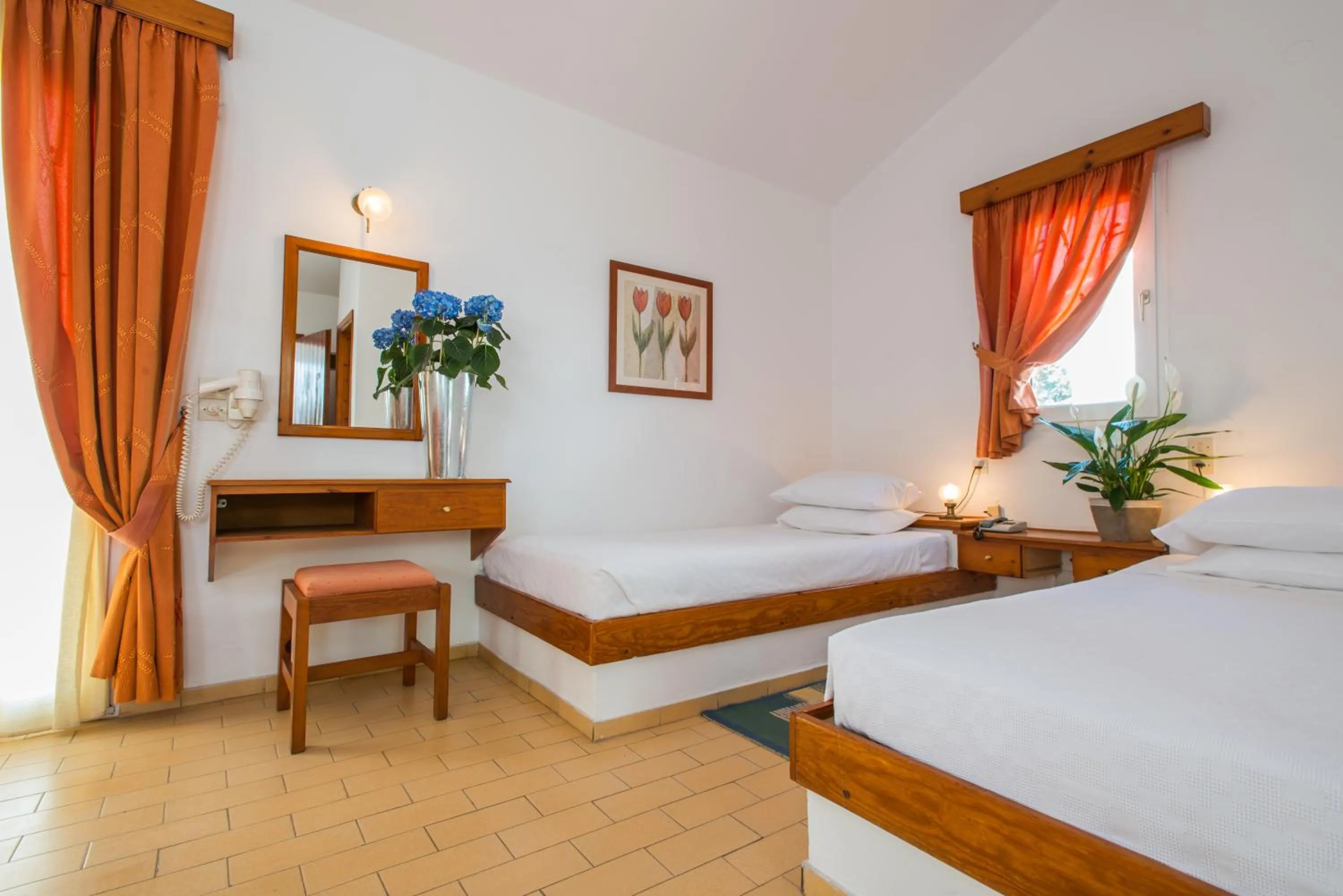Bedroom in Delfinia Hotel & Bungalows