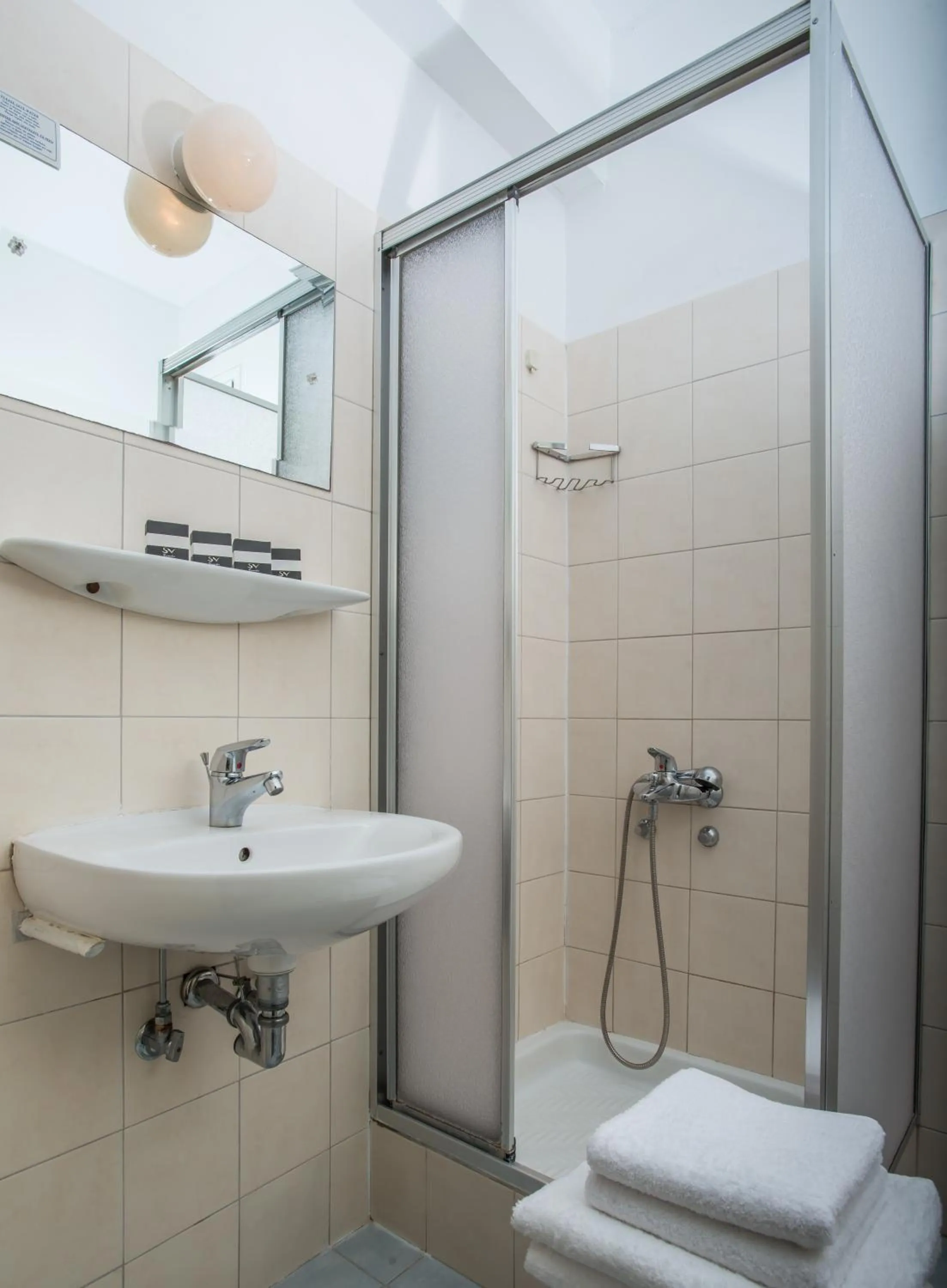 Bathroom in Delfinia Hotel & Bungalows