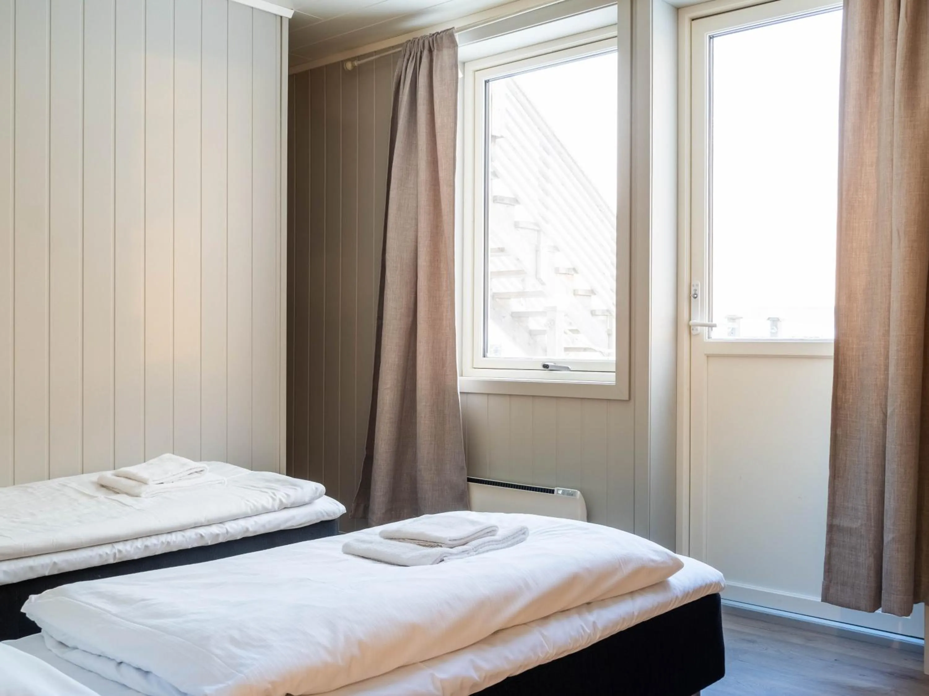 Bedroom, Bed in Lofoten Bed & Breakfast Reine - Rooms & Apartments