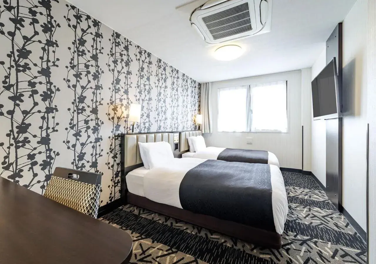 Photo of the whole room, Bed in APA Hotel Miyazaki Nobeoka Ekimae Photo of the whole room, Bed in APA Hotel Miyazaki Nobeoka Ekimae