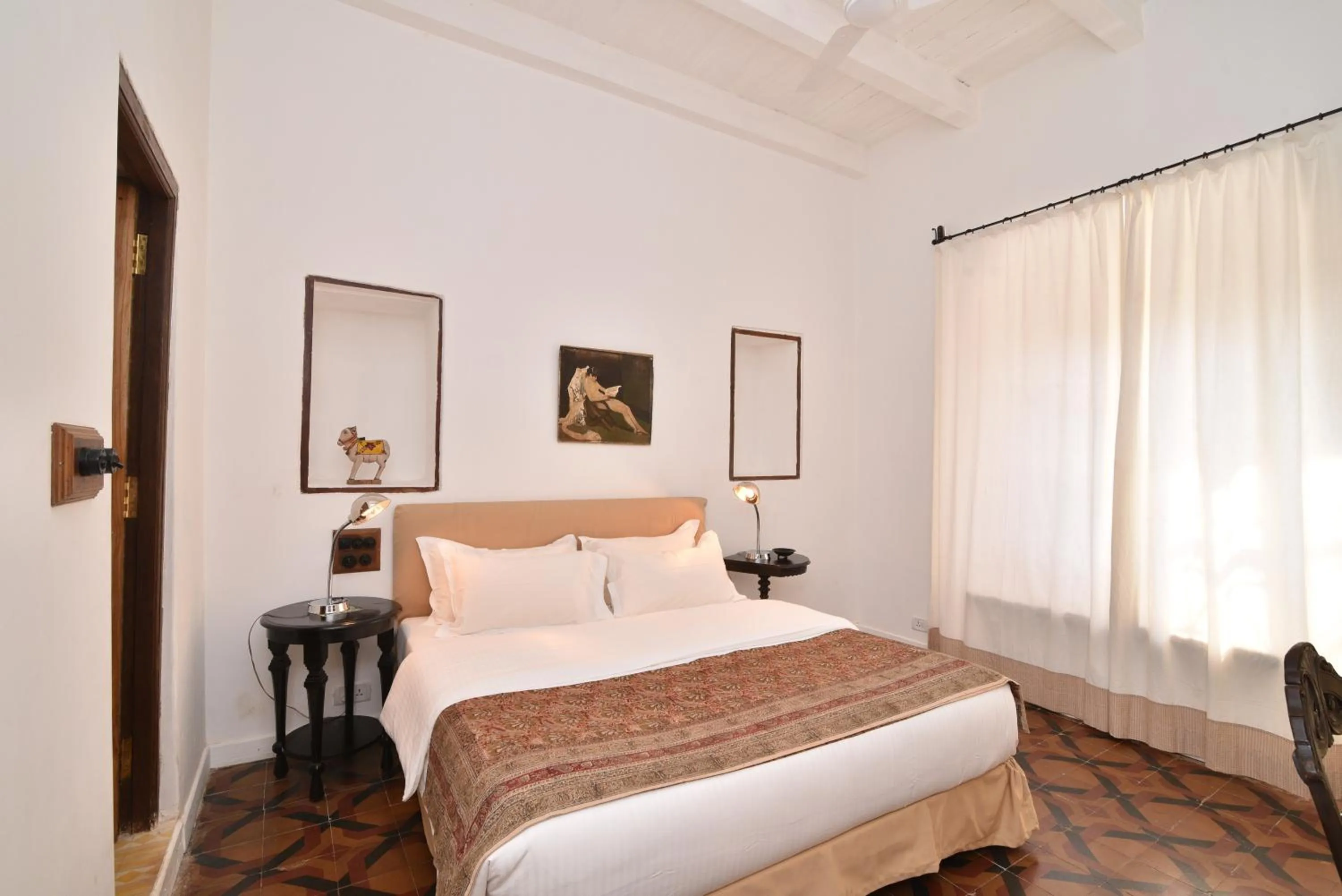 Bed in Mateus Boutique Hotel