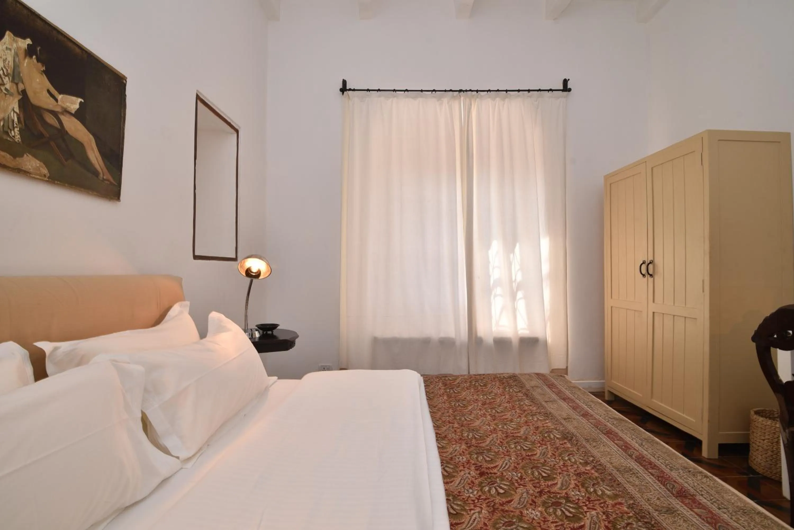 Bed in Mateus Boutique Hotel