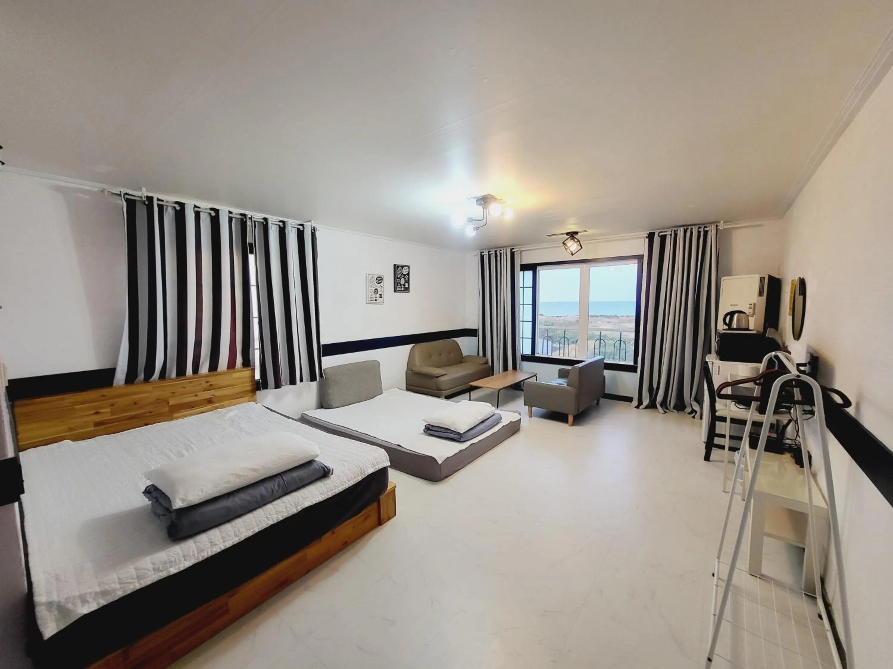 Bed in Morning Beach Pension