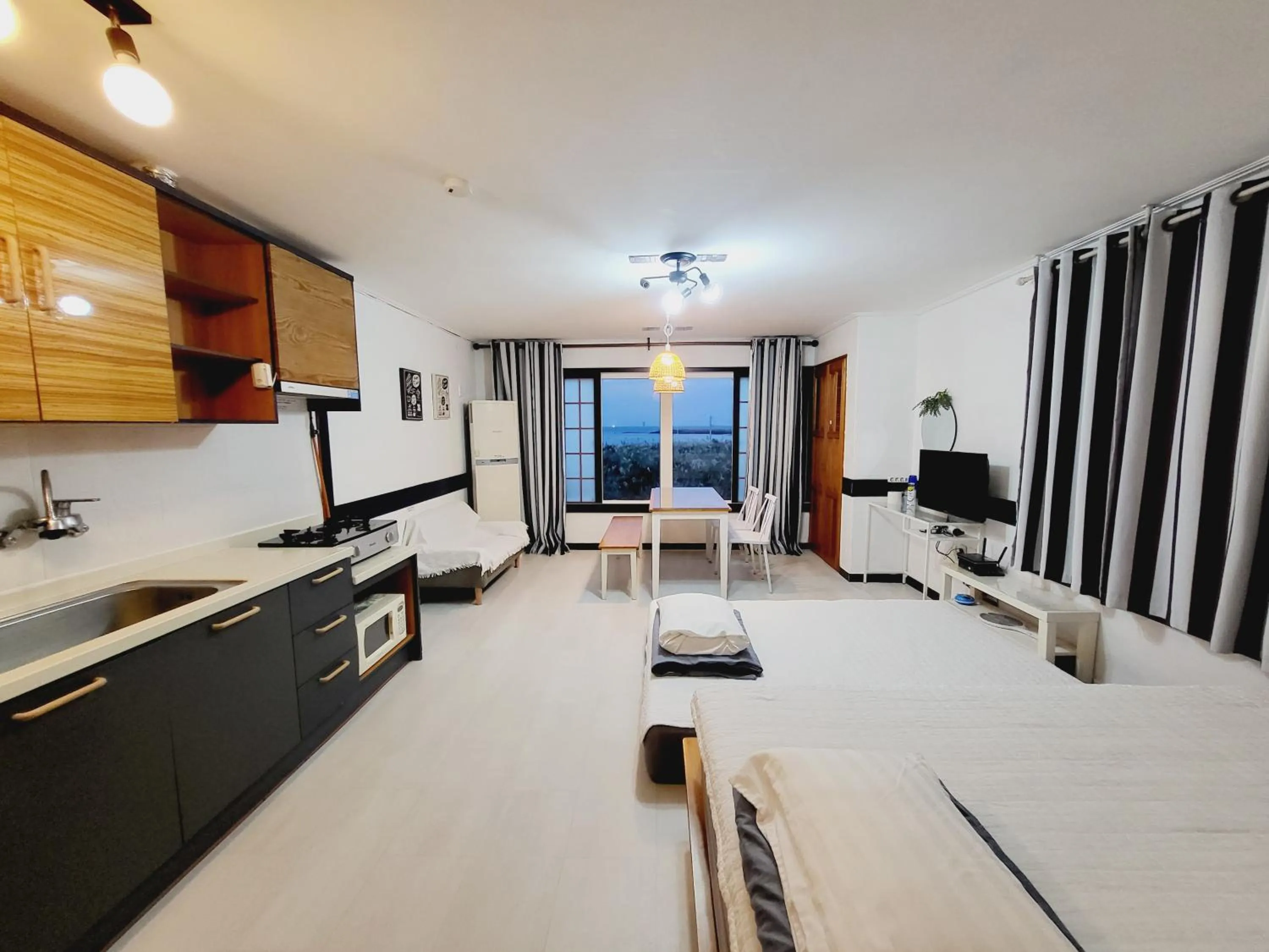 Bed in Morning Beach Pension