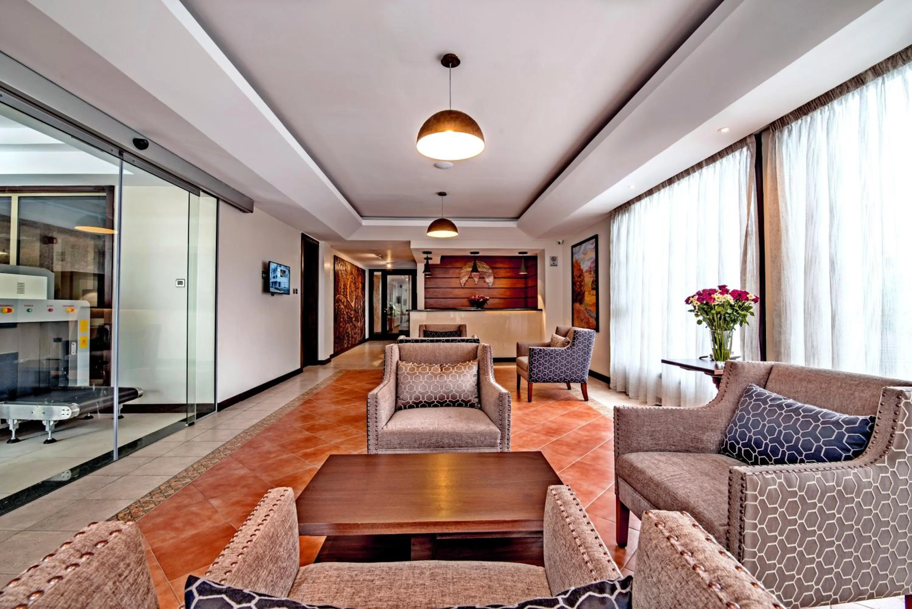 Lobby or reception, Seating Area in Magna Hotel and Suites
