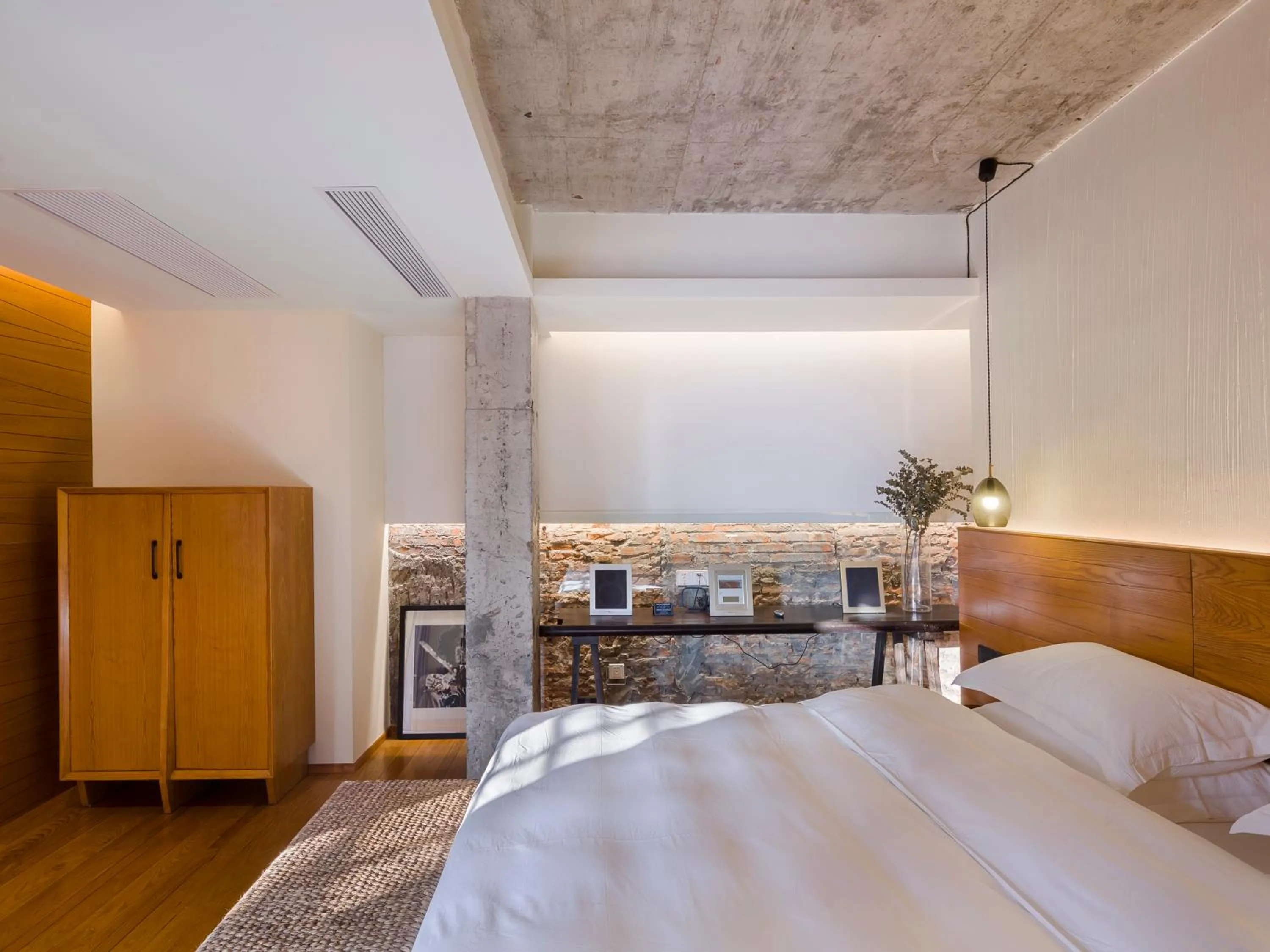 Bed in Zhuhai Bei Shan Ju Art Hotel