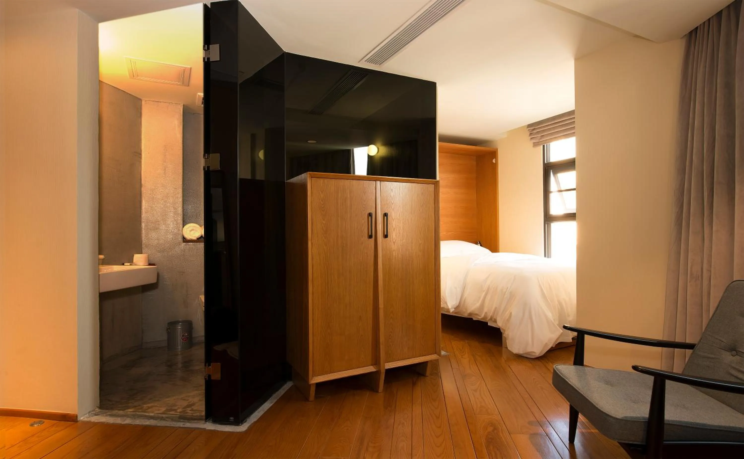 Living room, Bed in Zhuhai Bei Shan Ju Art Hotel