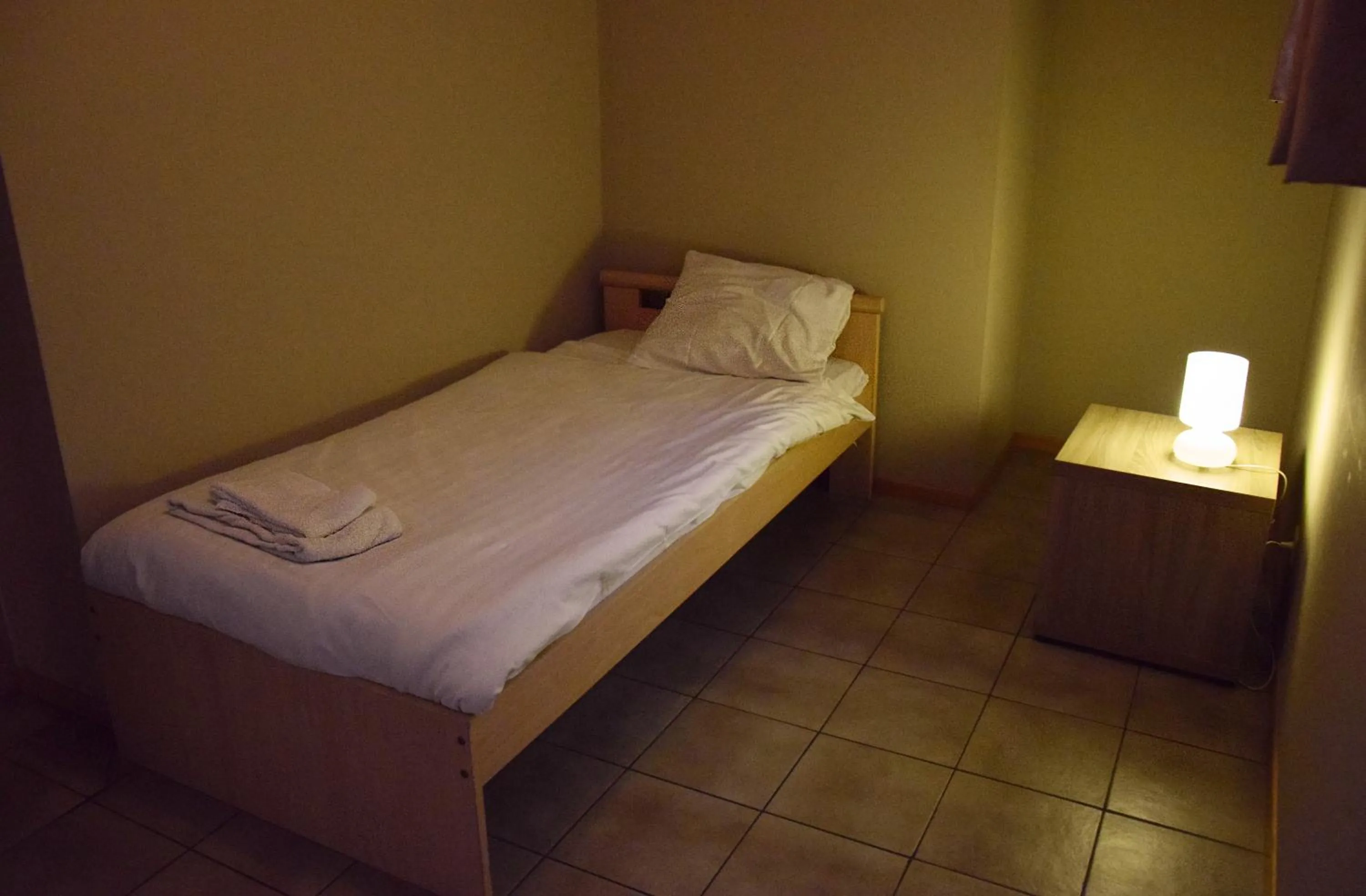 Bed in Condo Gardens Antwerp
