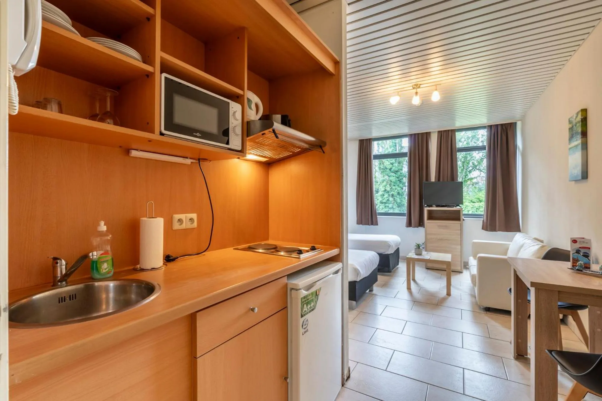 Kitchen or kitchenette in Condo Gardens Brussels