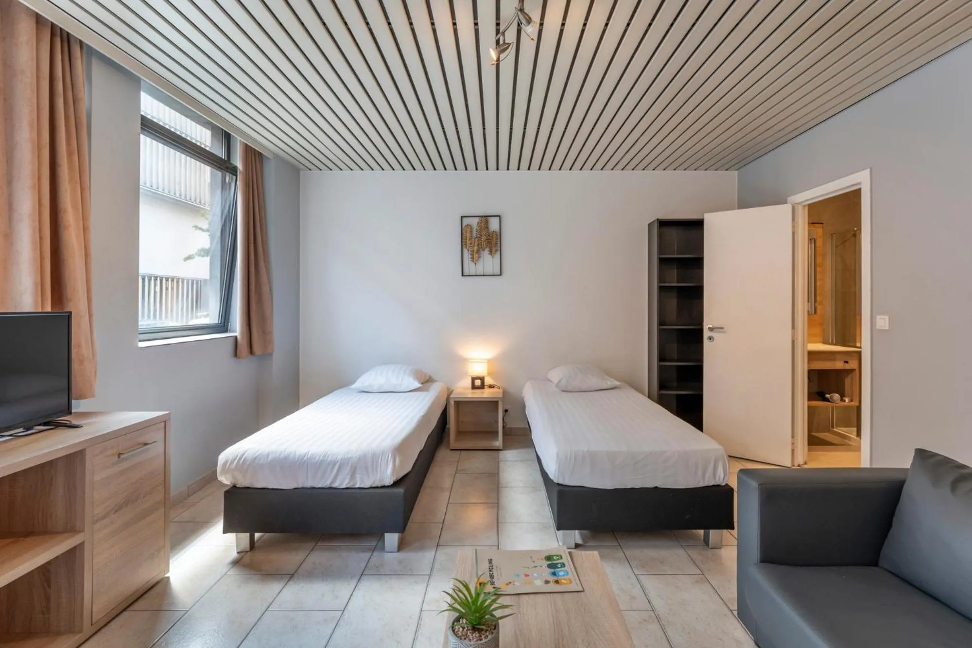 Bed in Condo Gardens Brussels