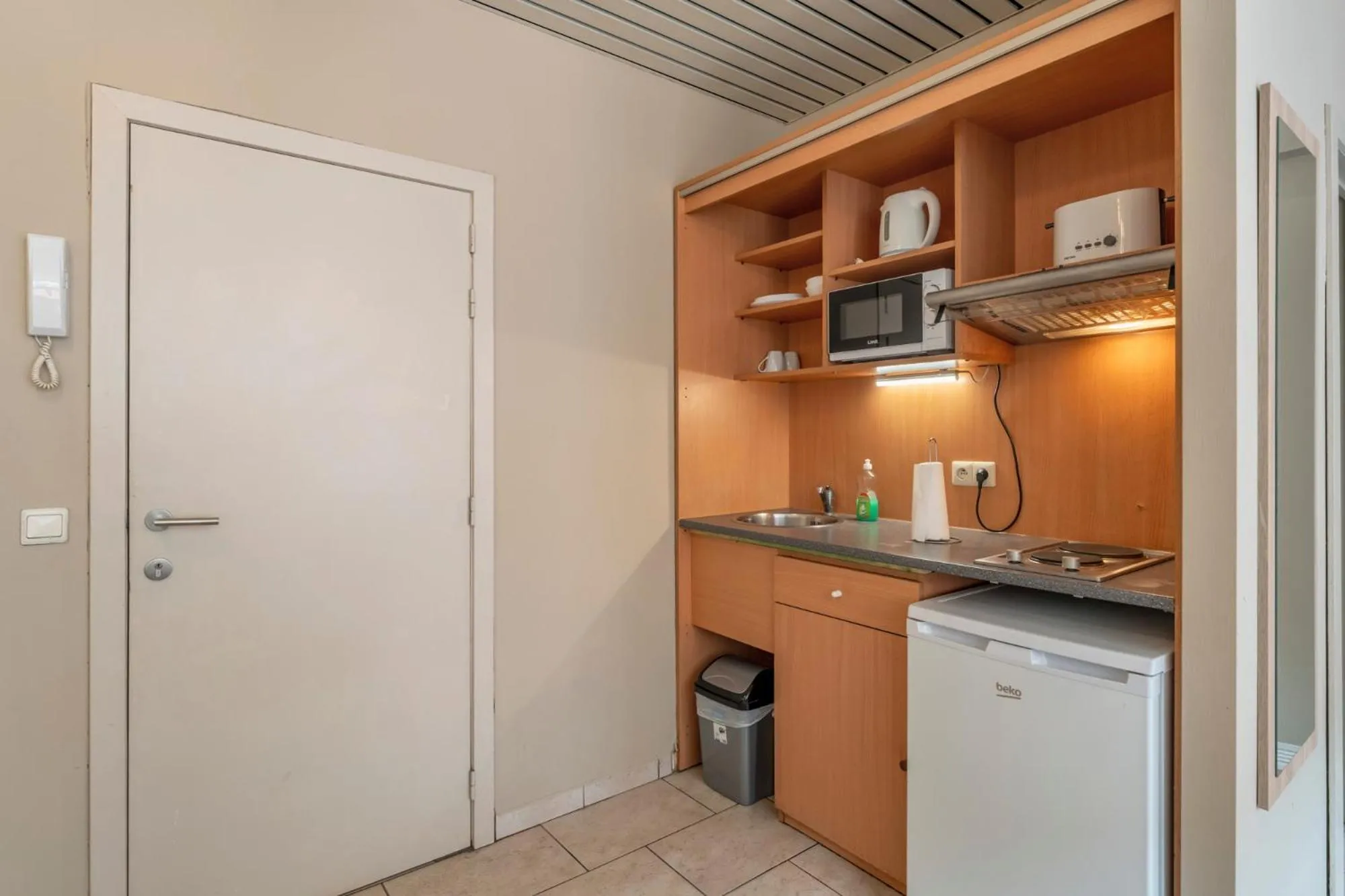 Kitchen or kitchenette in Condo Gardens Brussels