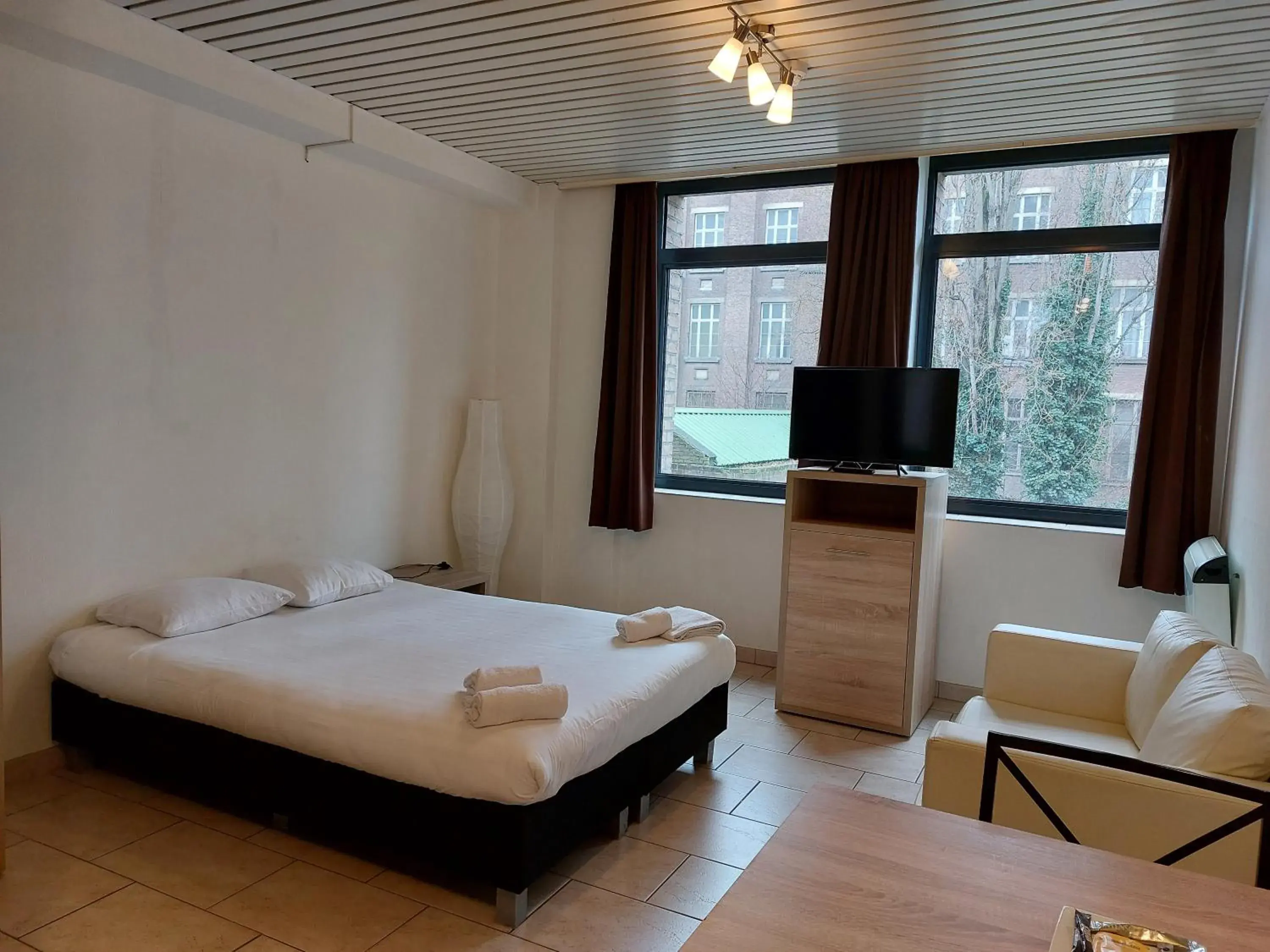 Executive Apartment double with daily cleaning in Condo Gardens Brussels Executive Apartment double with daily cleaning in Condo Gardens Brussels