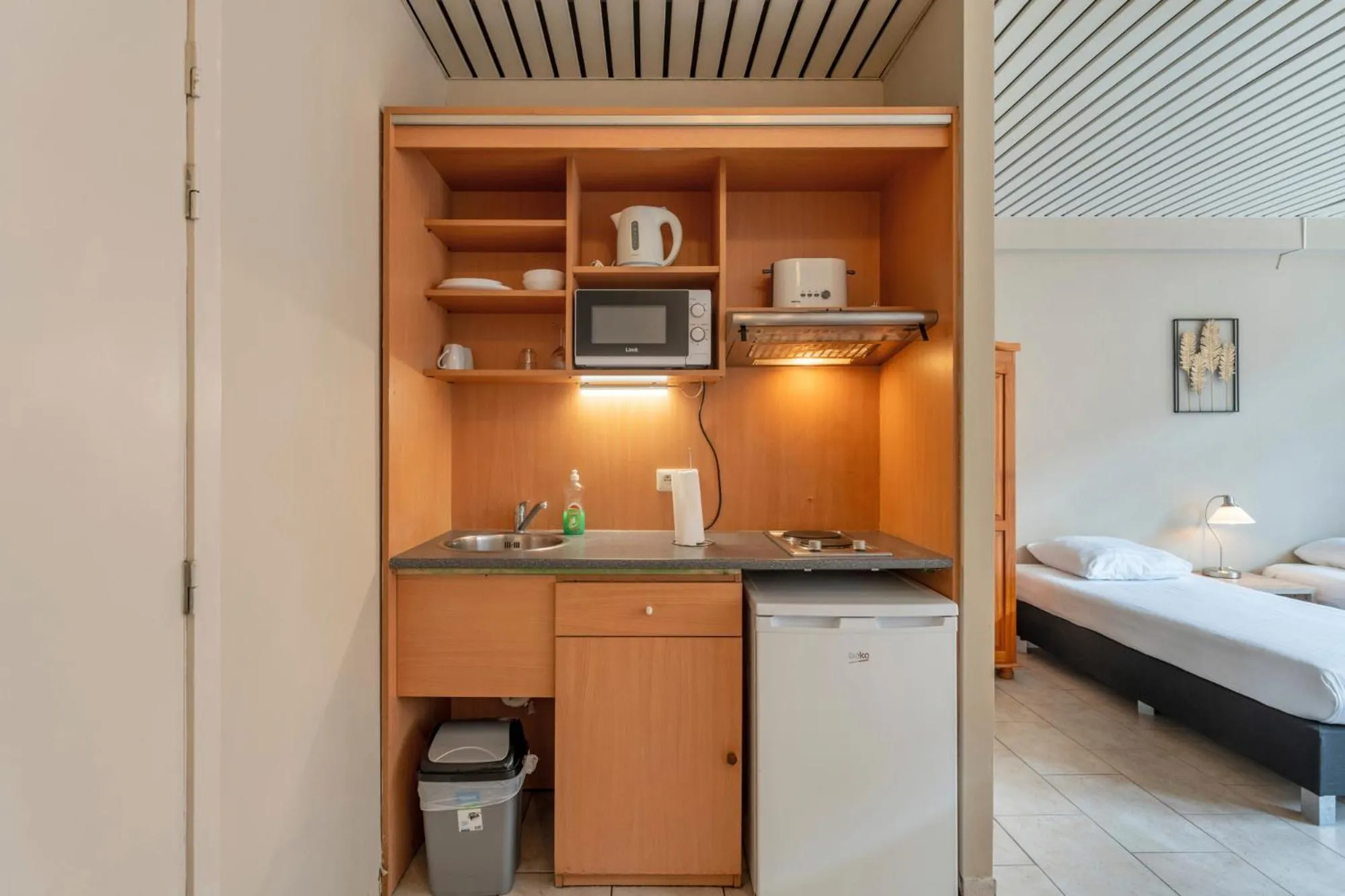 Coffee/tea facilities, Bed in Condo Gardens Brussels