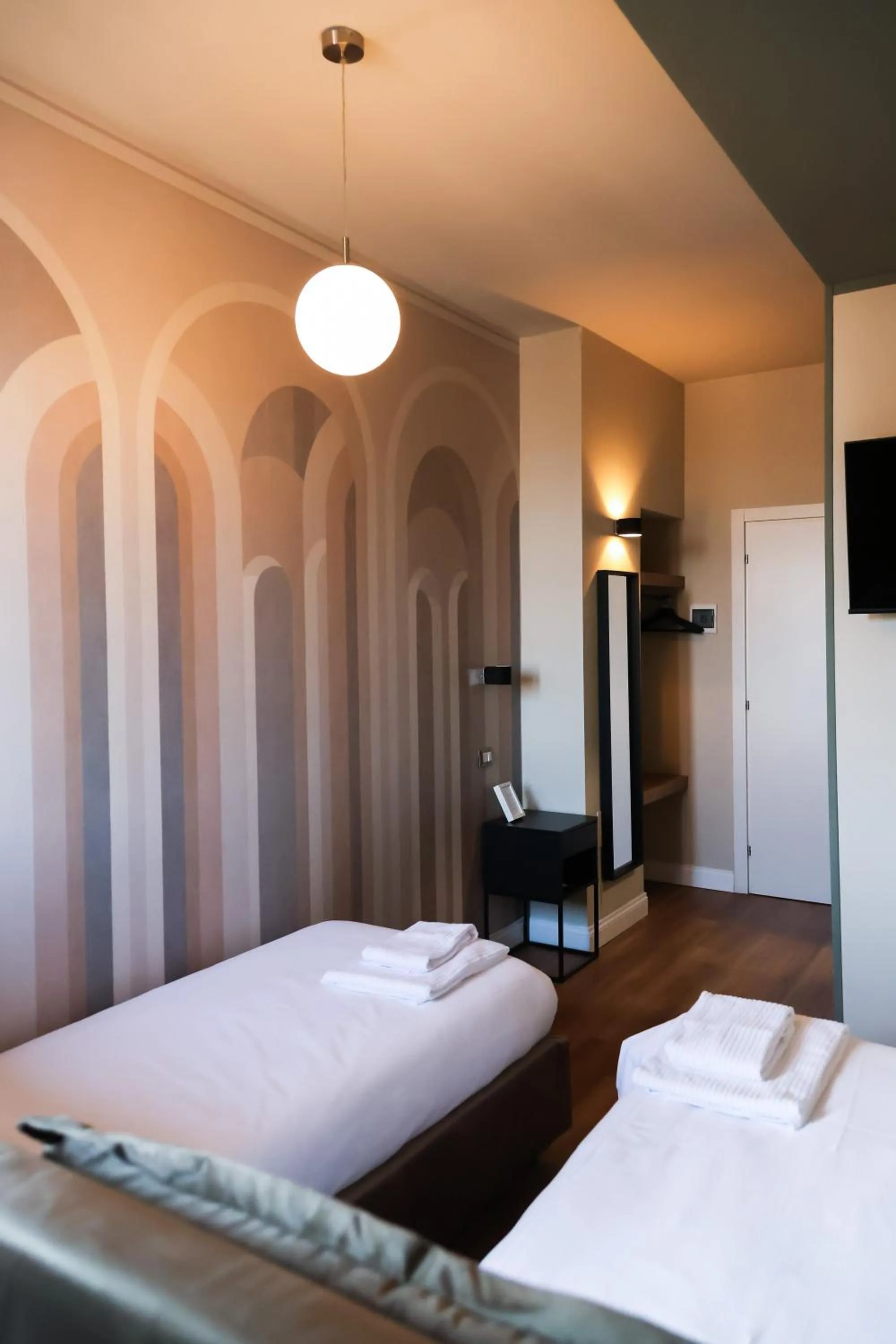 Bed in Corso Italia Rooms