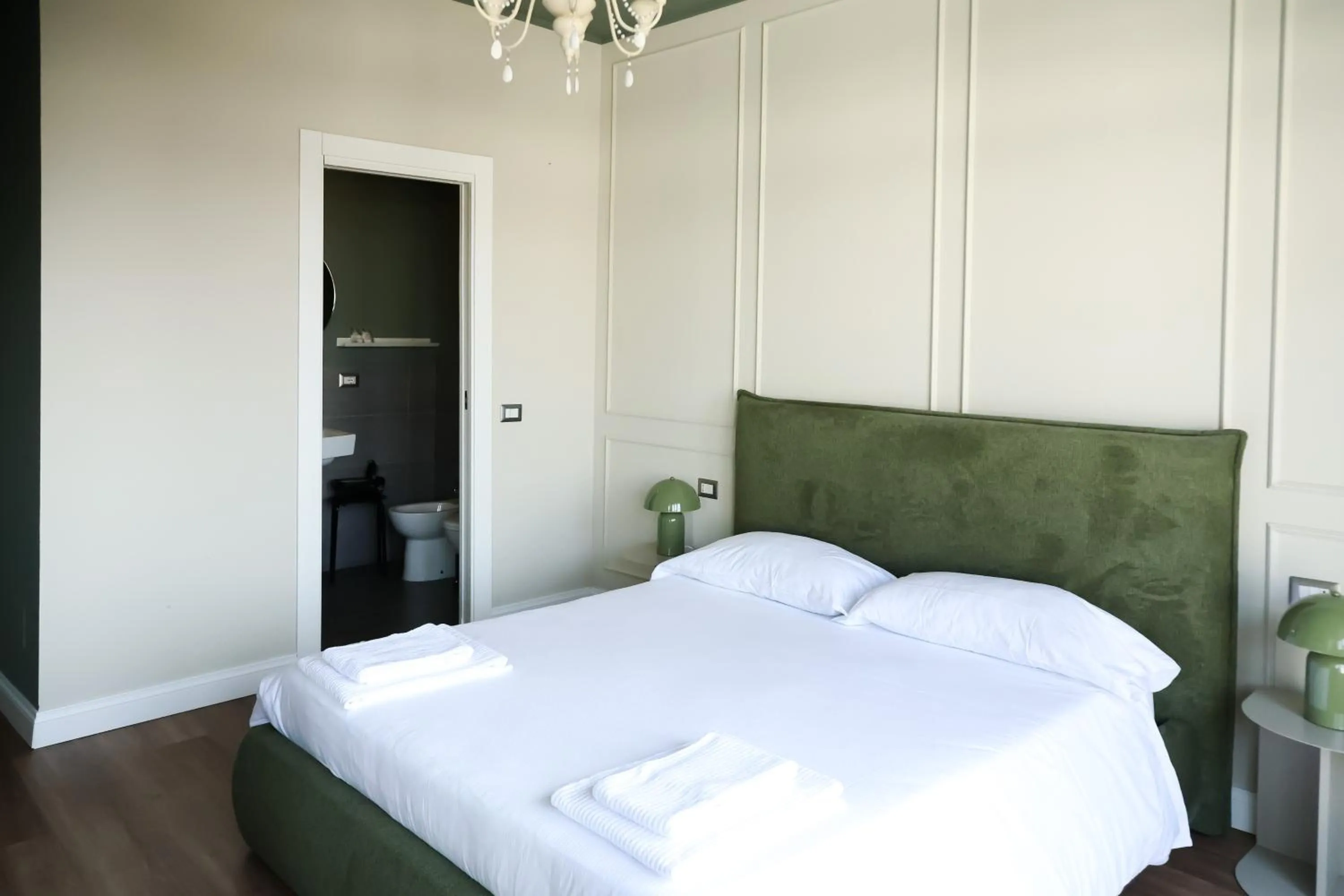 Bed in Corso Italia Rooms