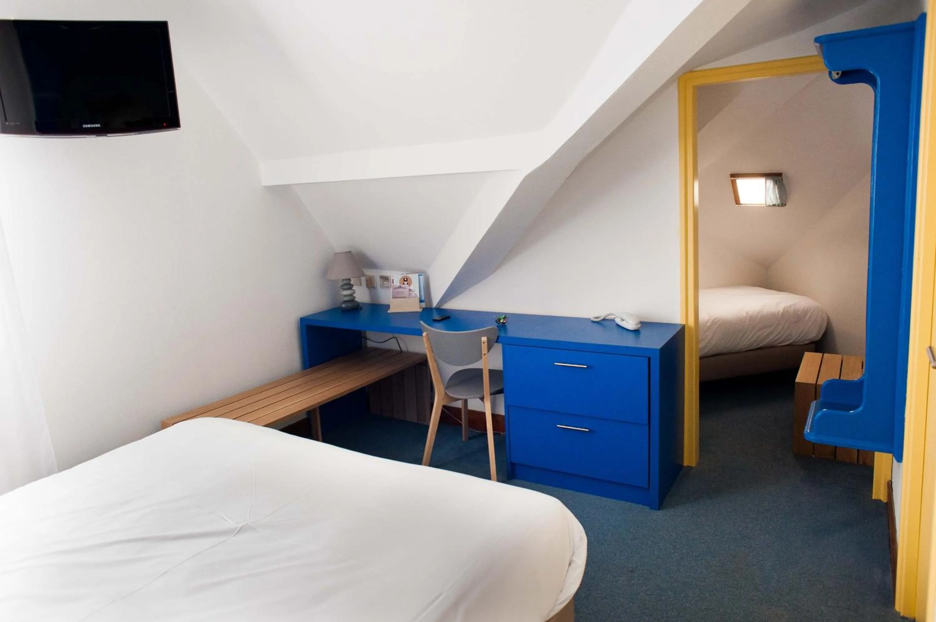 Photo of the whole room, Bed in Hôtel Le Dauphin