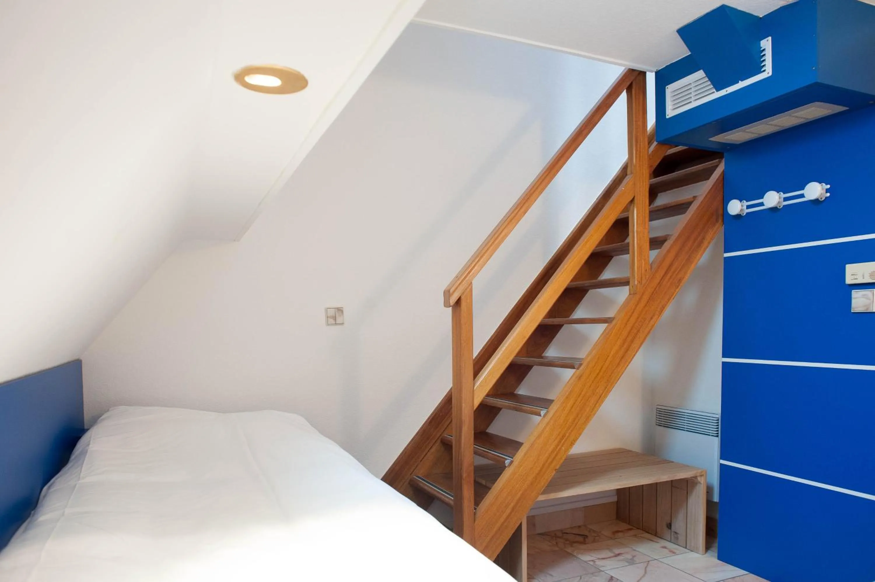 Bed in Hôtel Le Dauphin