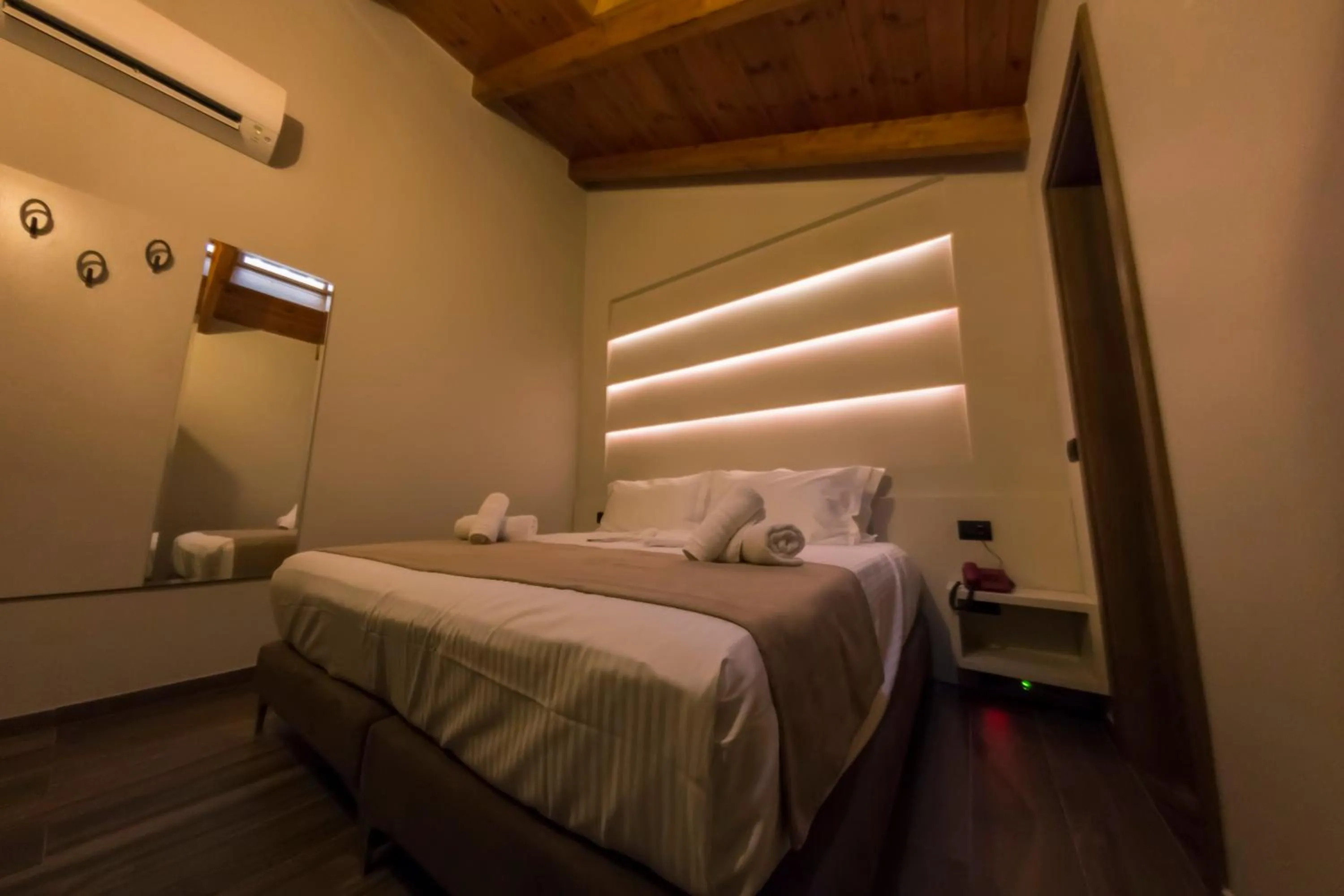 Bed in Hotel Pandora Residence