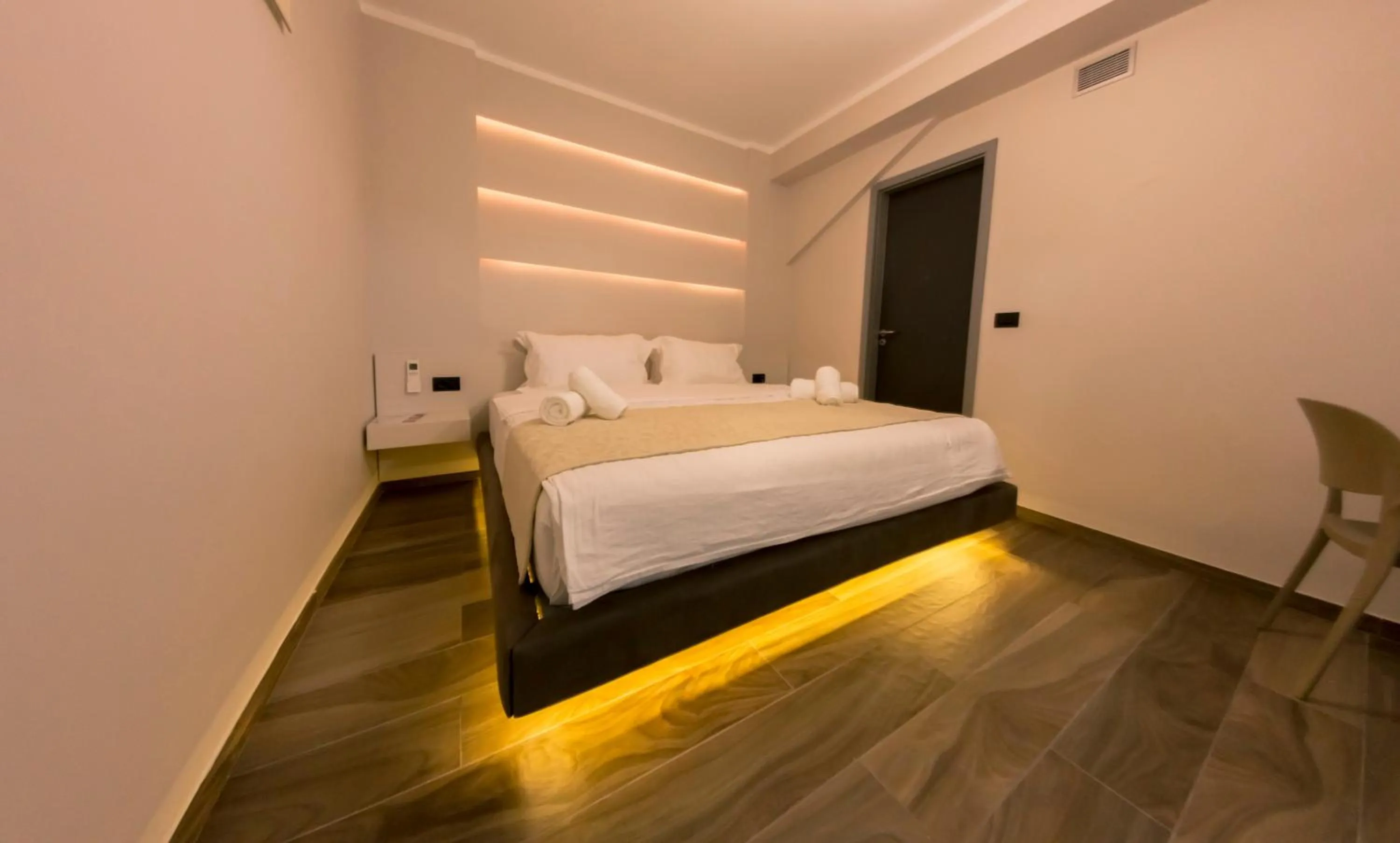 Bed in Hotel Pandora Residence