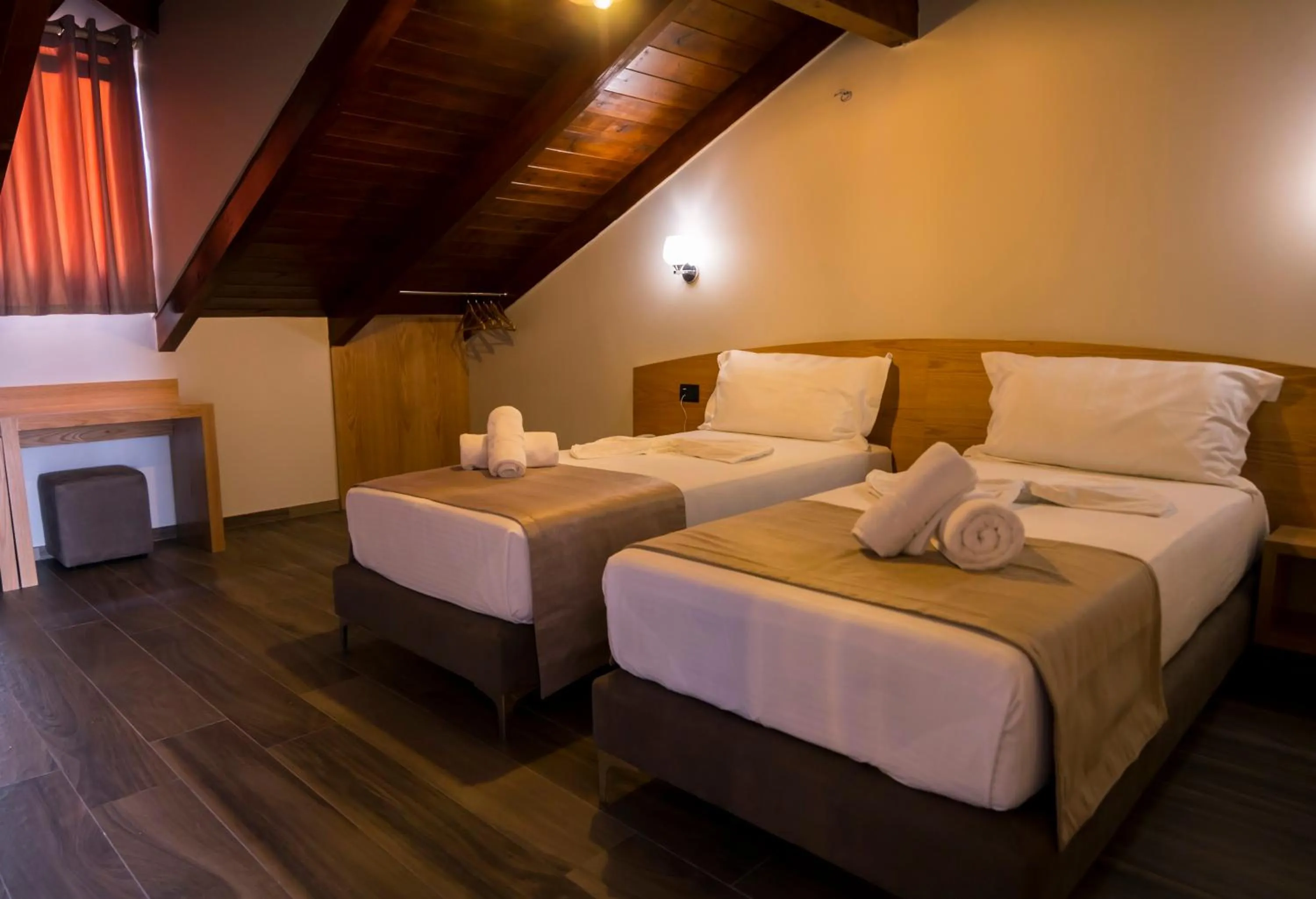 Bed in Hotel Pandora Residence