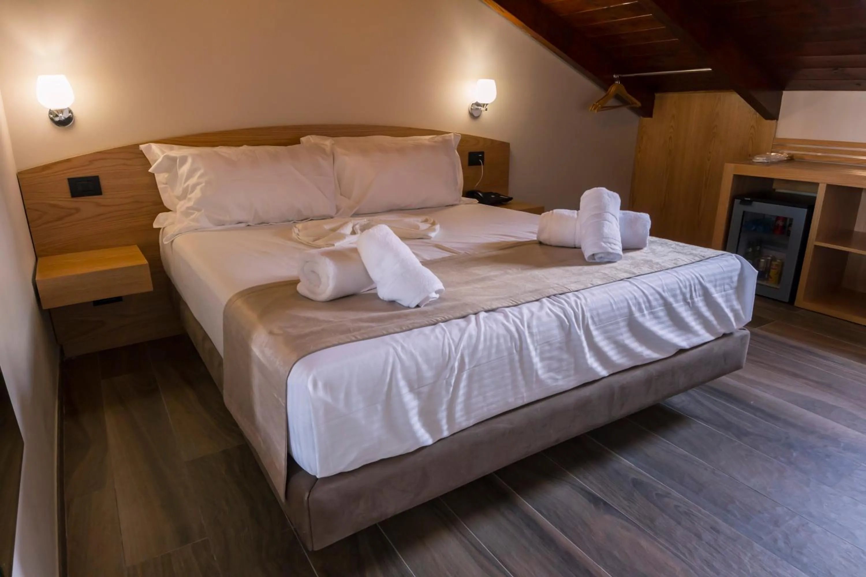 Toilet, Bed in Hotel Pandora Residence