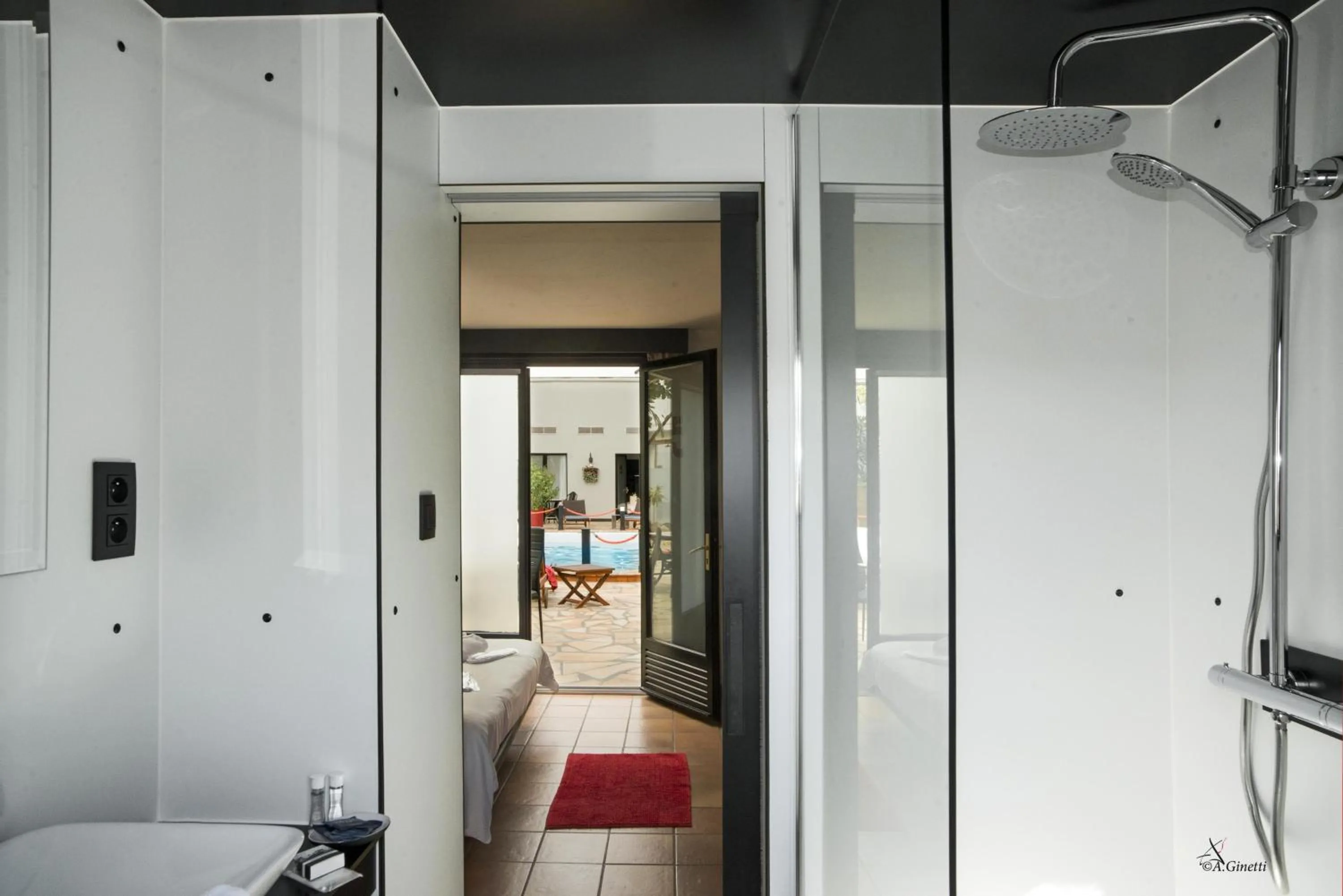 Bathroom, Bed in Tropical Hotel