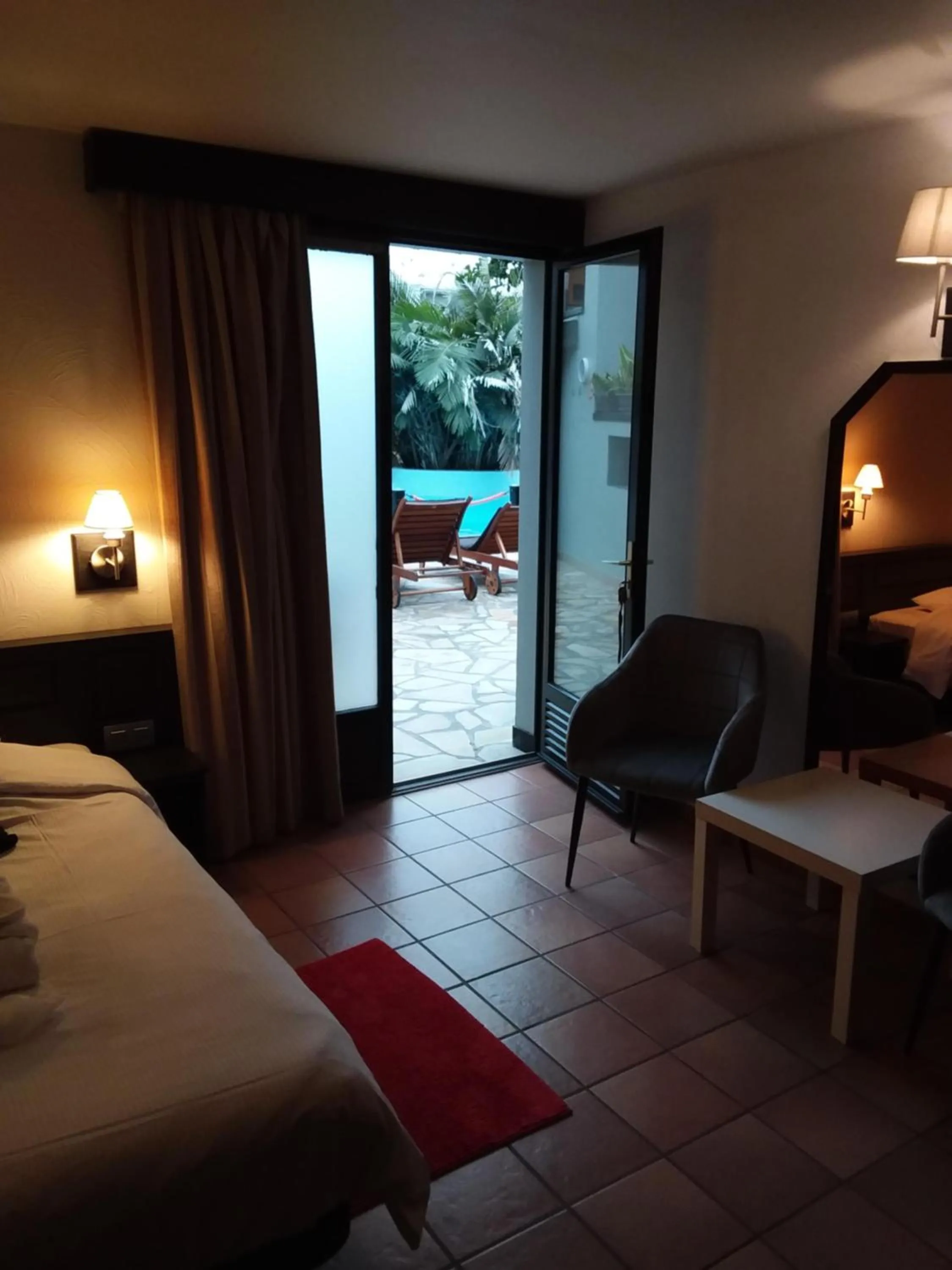 Photo of the whole room, Bed in Tropical Hotel